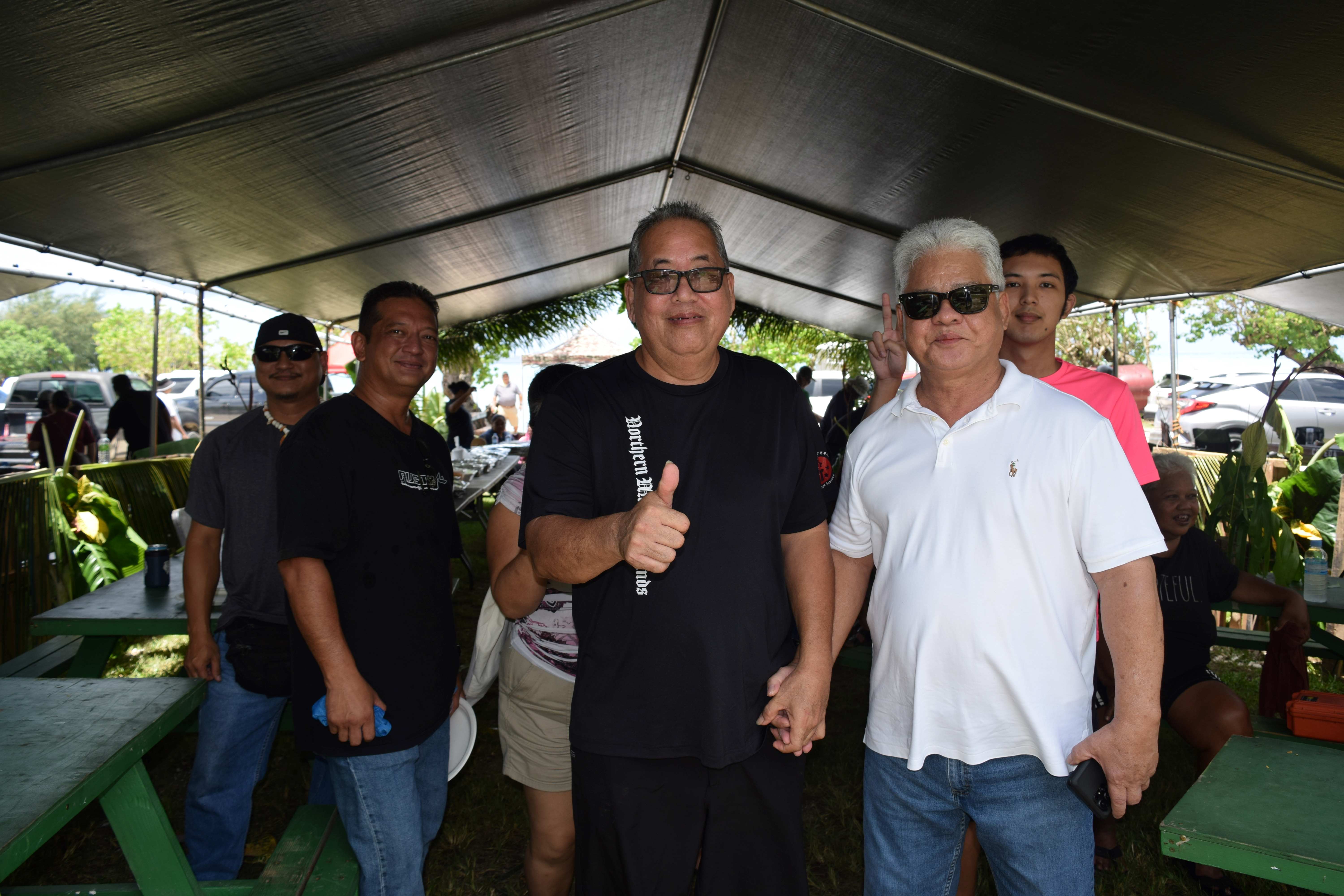 Gov. Arnold I. Palacios joins employees of the Department of Lands and Natural Resources  during the CNMI government’s Labor Day celebration at the Garapan Fishing Base on Sunday.
