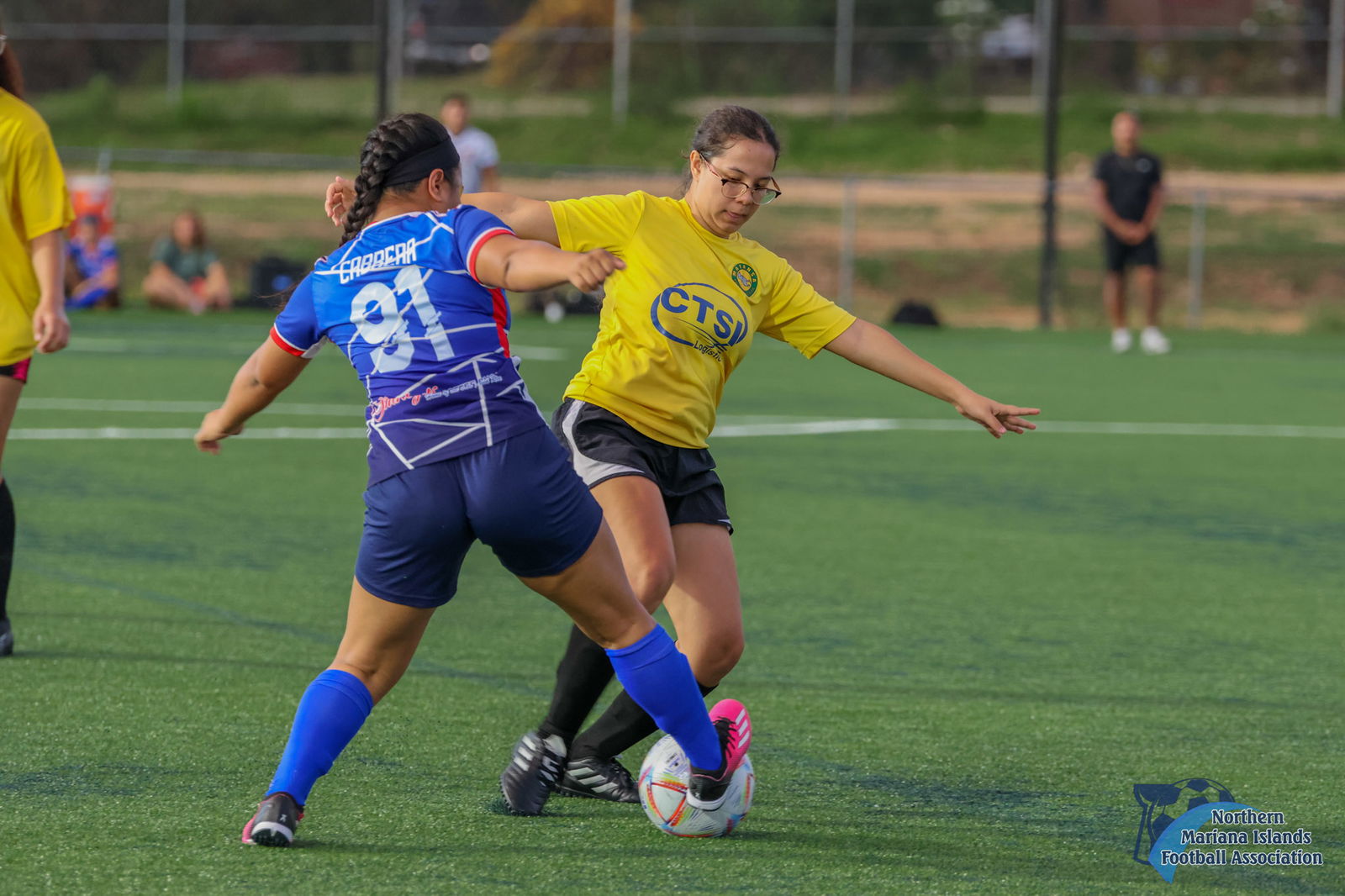 Matansa and Shirley's players extend in a fight for the possession during an intermediate division game of the Dove Women's League Fall 2023 Tuesday at the NMI Soccer Training Center in Koblerville.