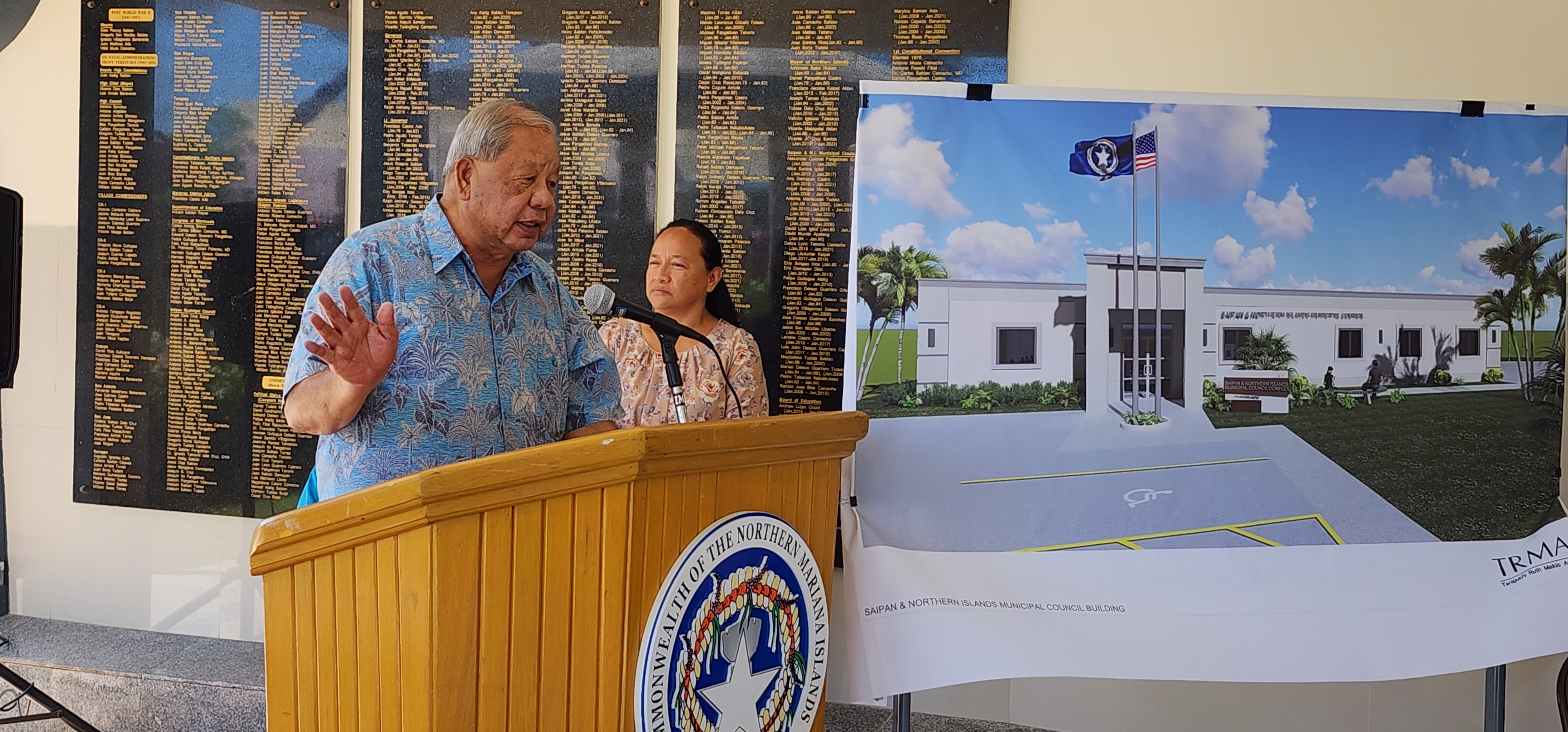 Lt. Gov. David M. Apatang gestures as he delivers his remarks at the Chalan Kanoa Leadership Memorial Kiosku on April 19, 2023. Also in photo: Saipan and Northern Islands Municipal Council  member Carmen Cabrera Pangelinan, and an artist’s rendition of the new municipal building.
