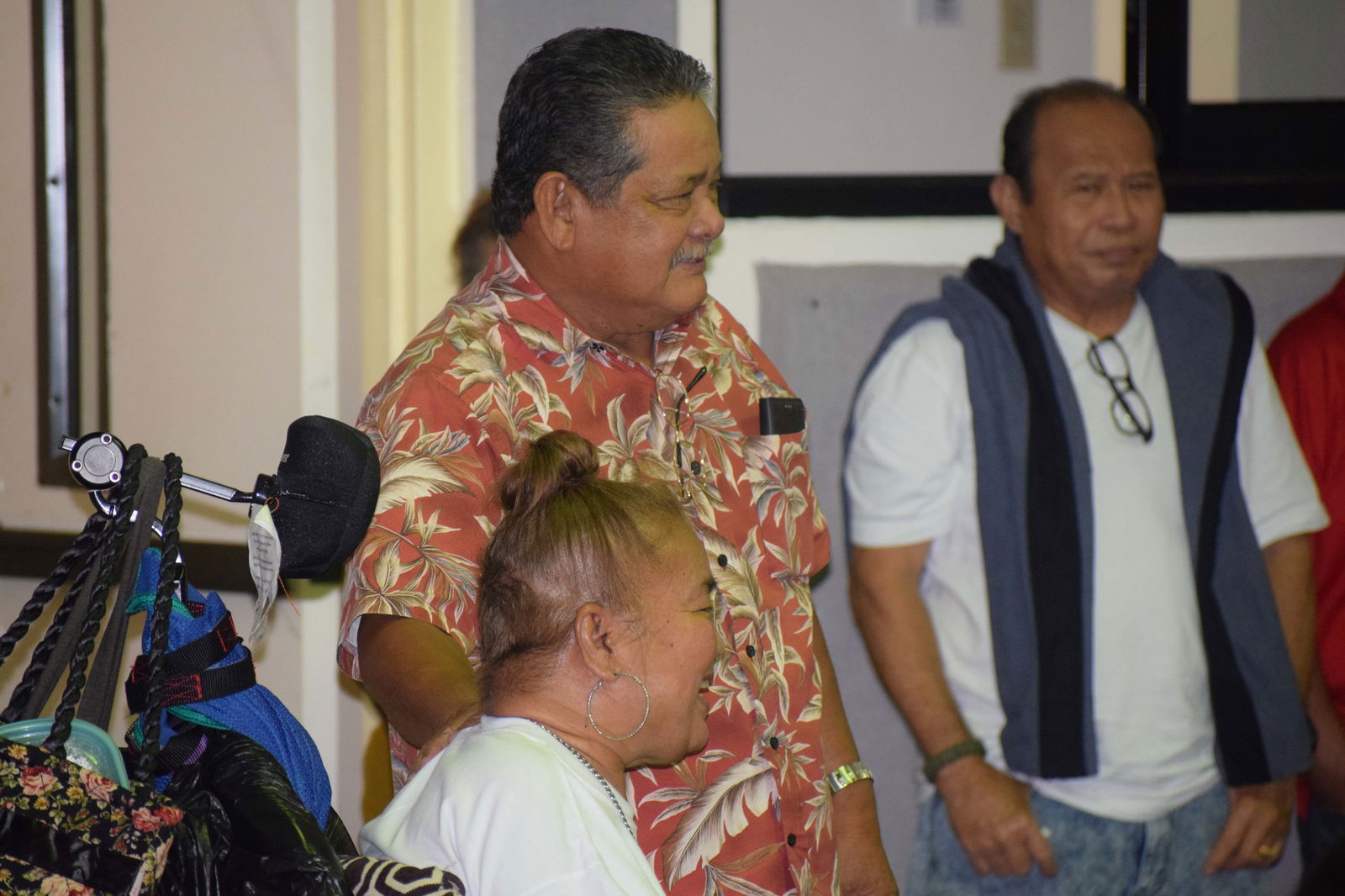 Chief Justice Alexandro Castro greets Cynthia Attao.