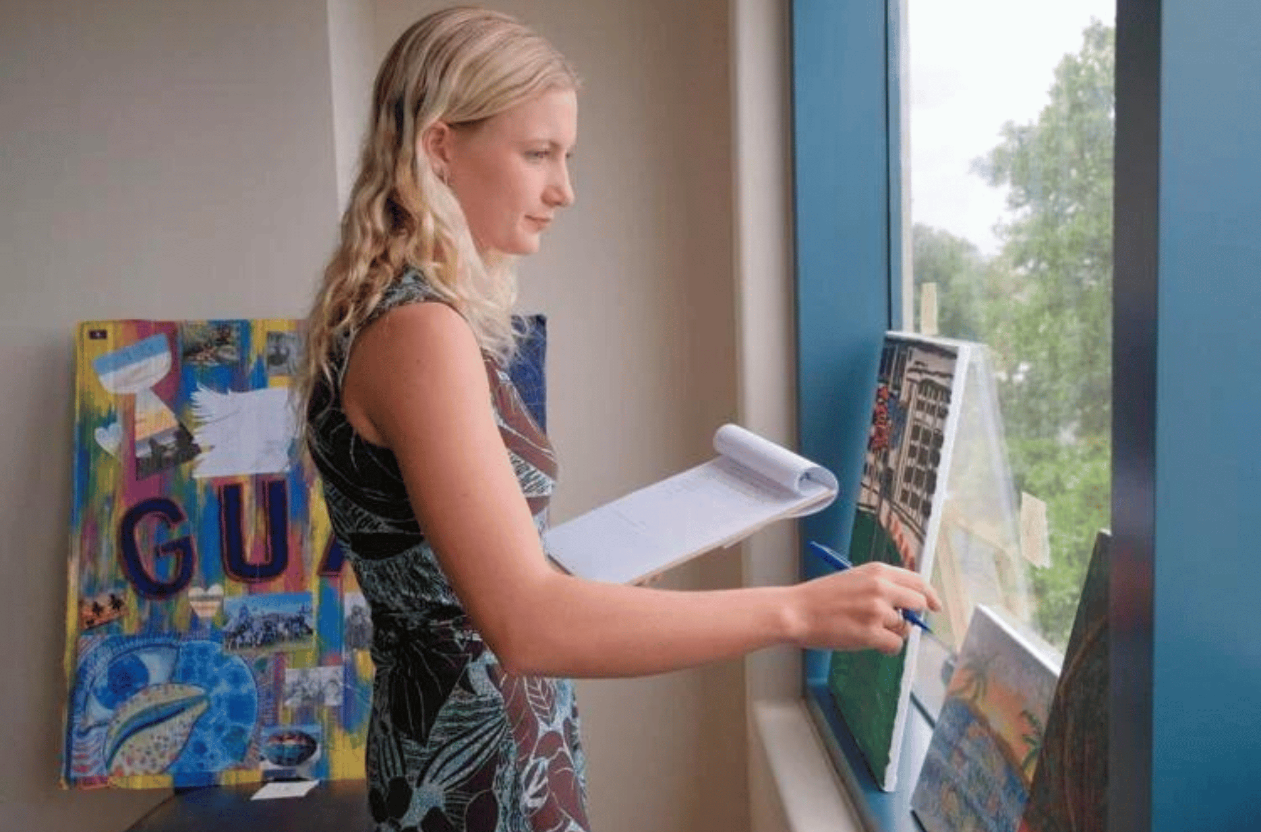 Lily Vinch, Guam Youth Congress speaker, judges submissions for the 2023 Congressional Art Competition at the office of Del. James C. Moylan in Hagåtña on Saturday, April 22, 2023.