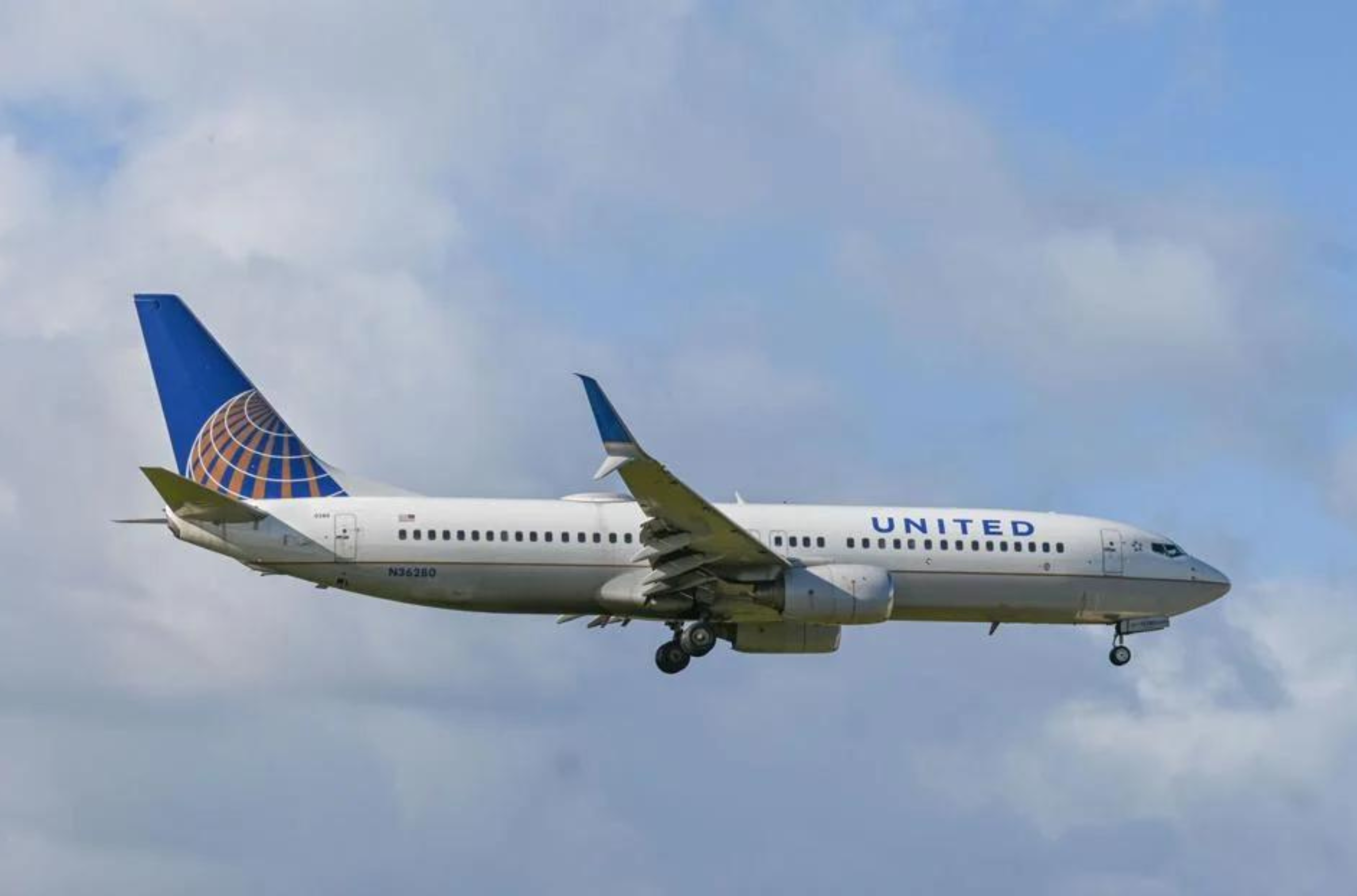 A United Airlines plane comes in for a landing at the A.B. Won Pat International Airport on Dec. 19, 2022. 