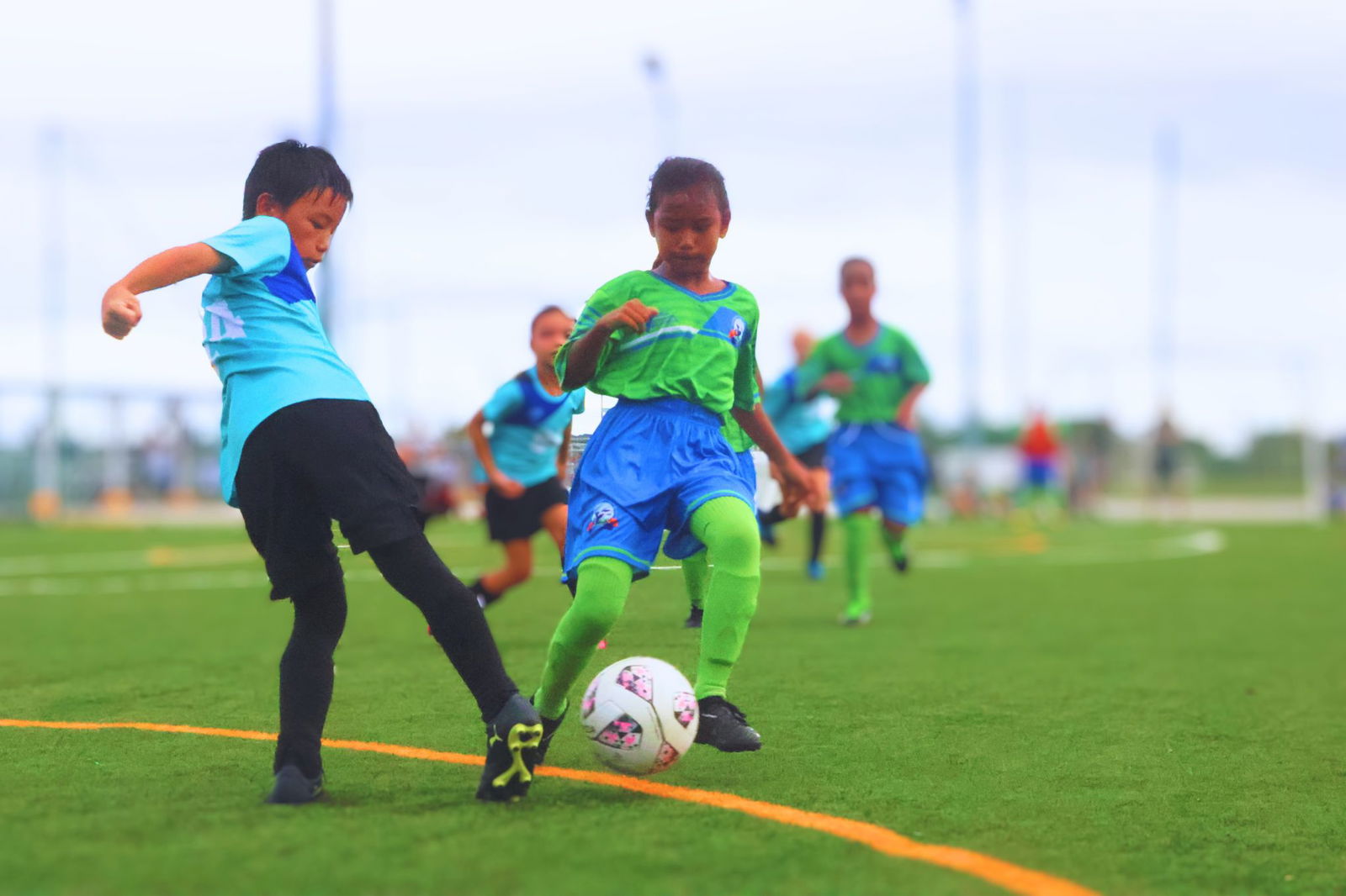 Saipan International School's Willie Guo extends for the interception against a William S. Reyes Elementary School 2 player during an elementary school division game of the NMIFA-PSS Interscholastic Soccer League SY 23-24 on Monday at the NMI Soccer Training Center in Koblerville.