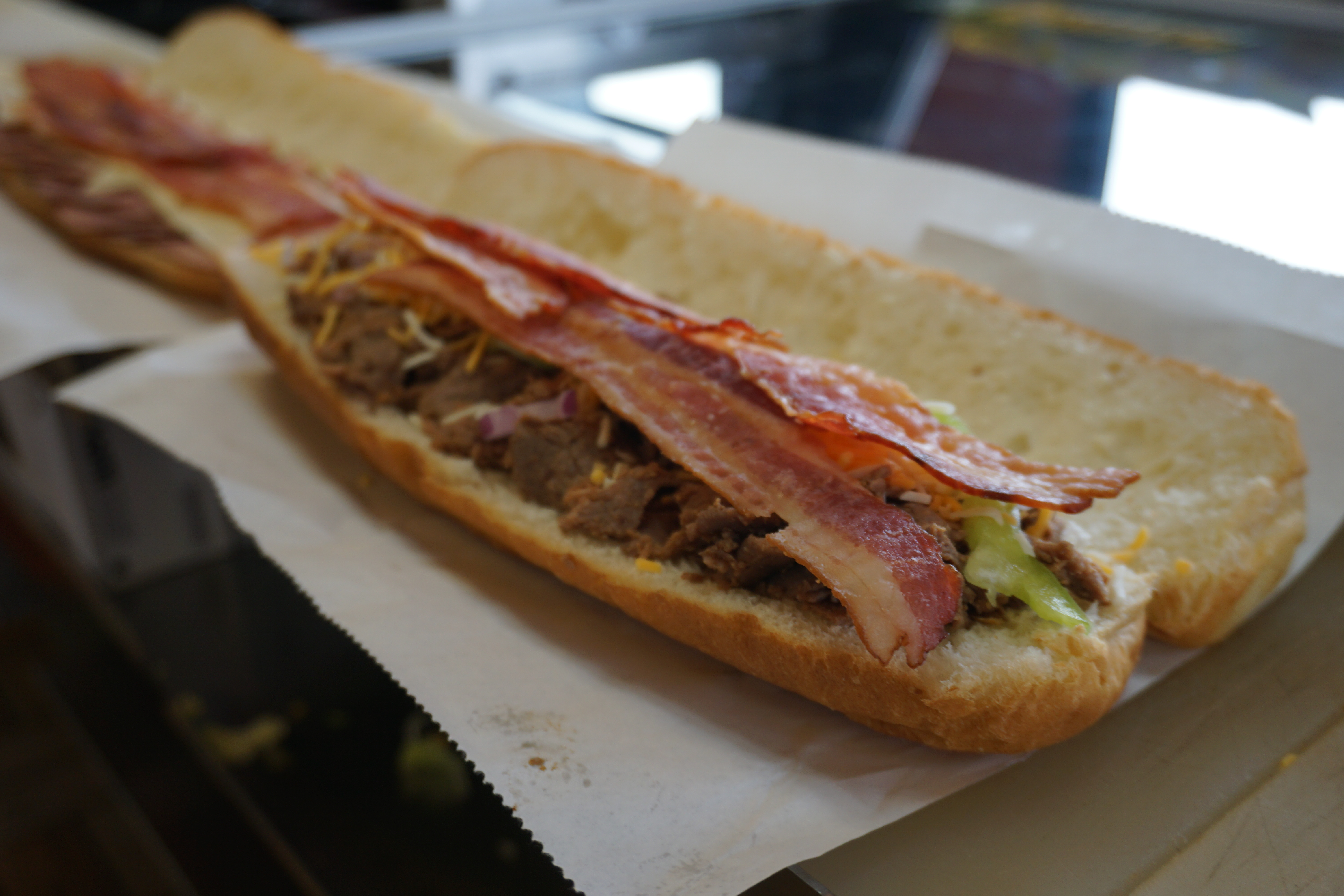 Toasting makes a sandwich better in my humble opinion. This is a #3 The Monster right before it was tossed in the oven.