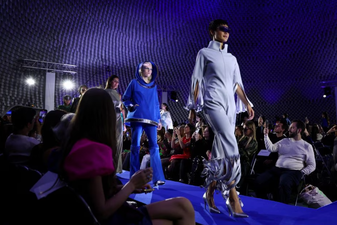 Models present creations by the creative studio of Pierre Cardin fashion house for their Spring/Summer 2024 Women's ready-to-wear collection show during Paris Fashion Week in Paris, France, Sept. 25, 2023.