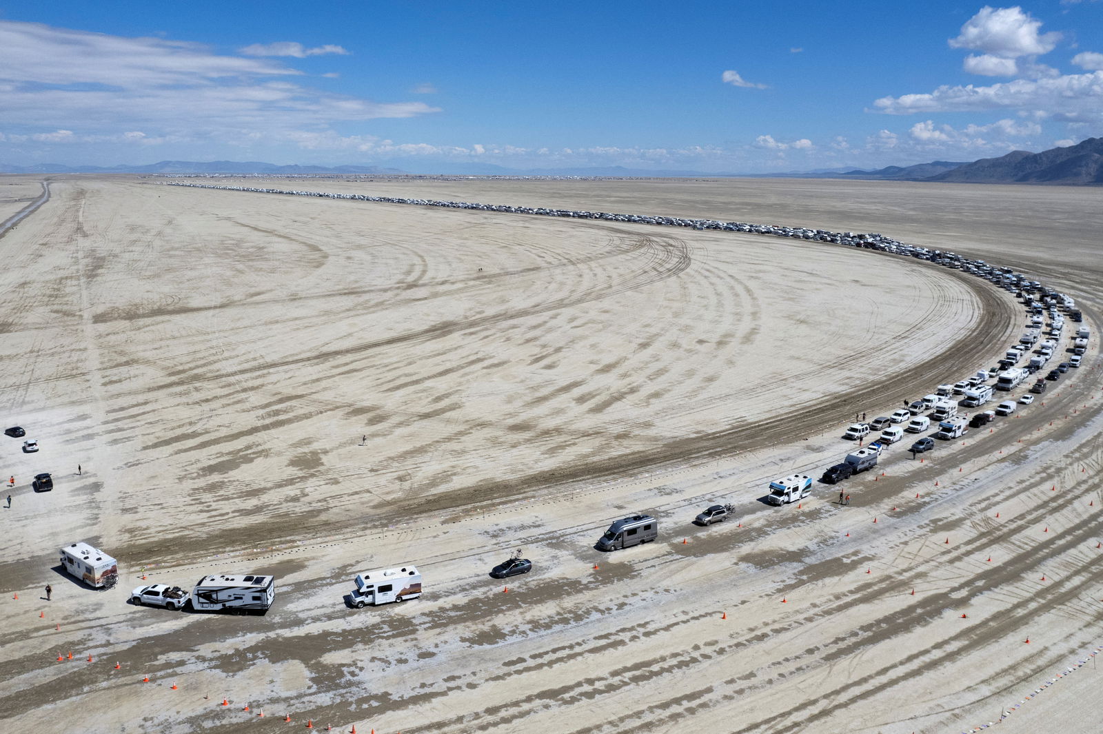 Vehicles are seen departing the Burning Man festival in Black Rock City, Nevada, U.S., September 4, 2023. REUTERS/Matt Mills McKnight
