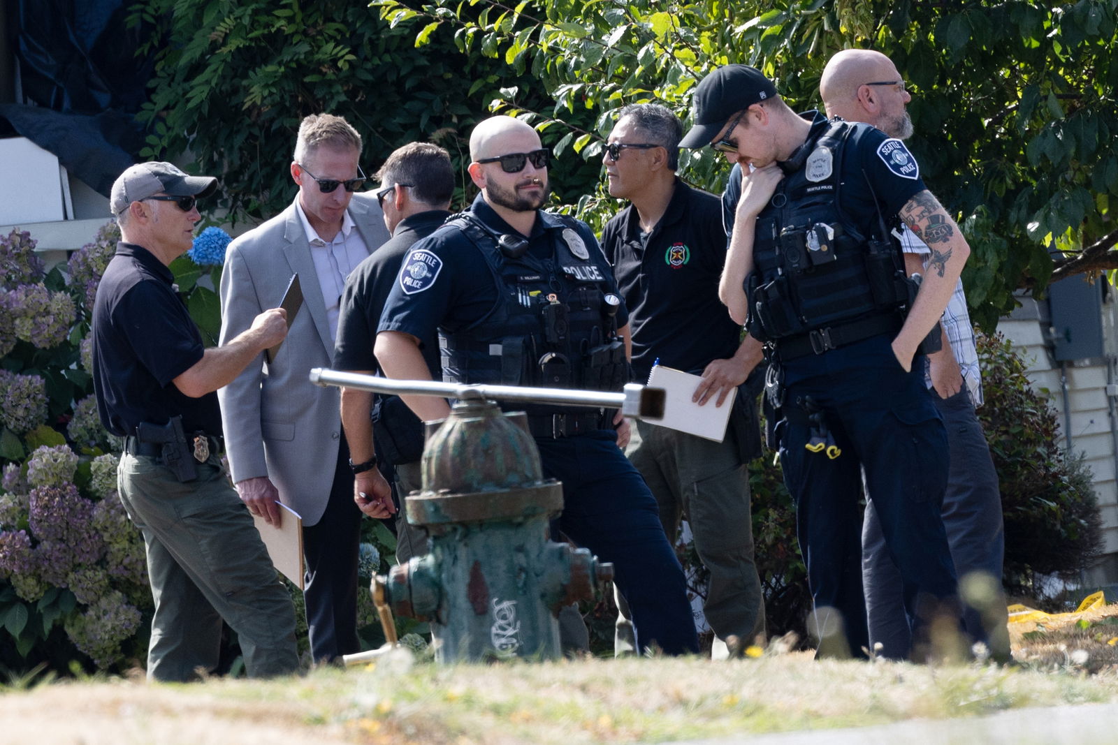 Seattle police and fire teams respond to a fire and reported shooting at a Wallingford home in the 1000 block of North 48th Street in Seattle on Sept. 2, 2023. (Karen Ducey/The Seattle Times/TNS)
