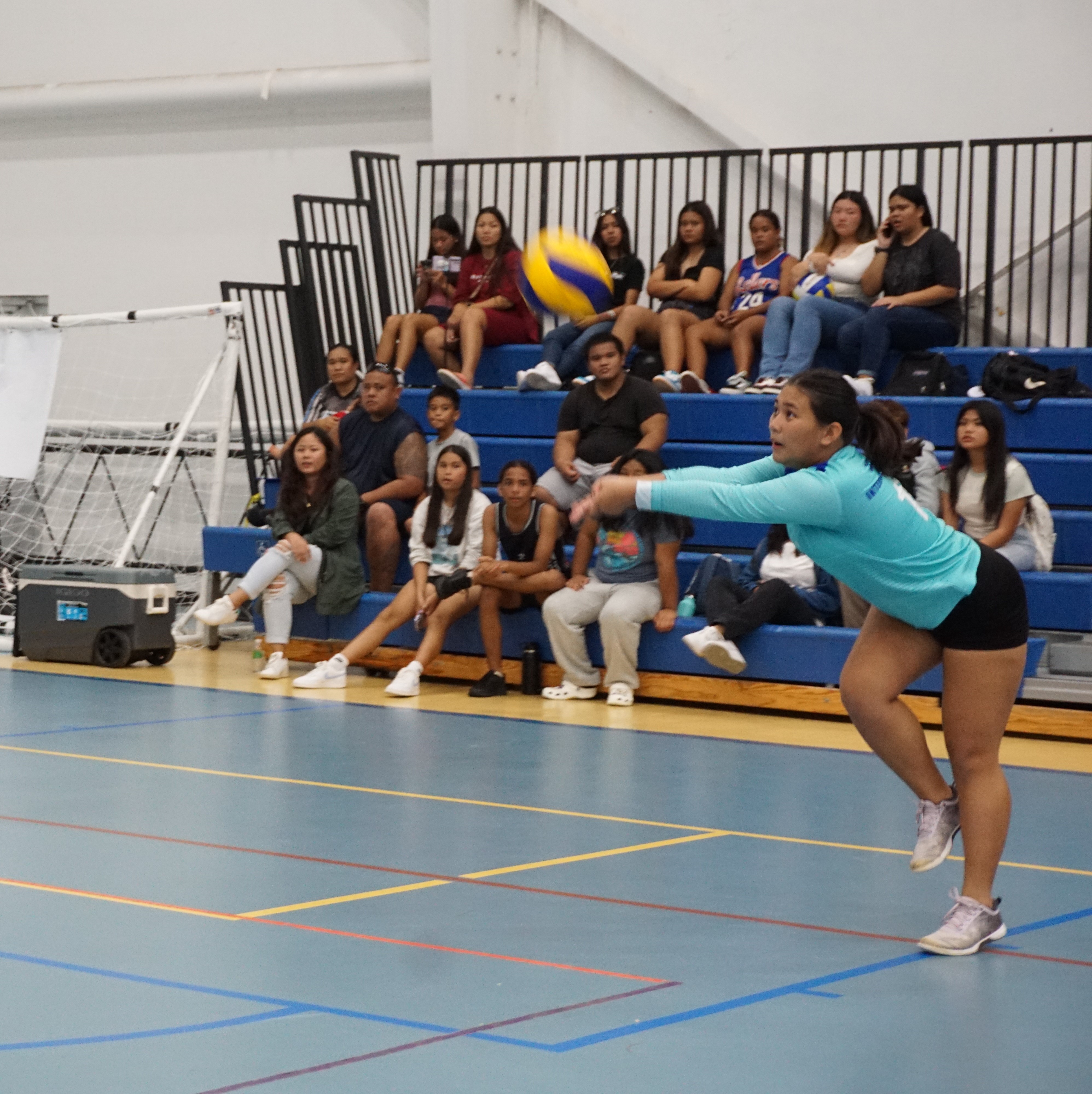 Saipan International School II's Kaylie Claveria extends for the bump return during a girls high school division game of the NMIVA-PSS Interscholastic Volleyball League at the Marianas High School gym.