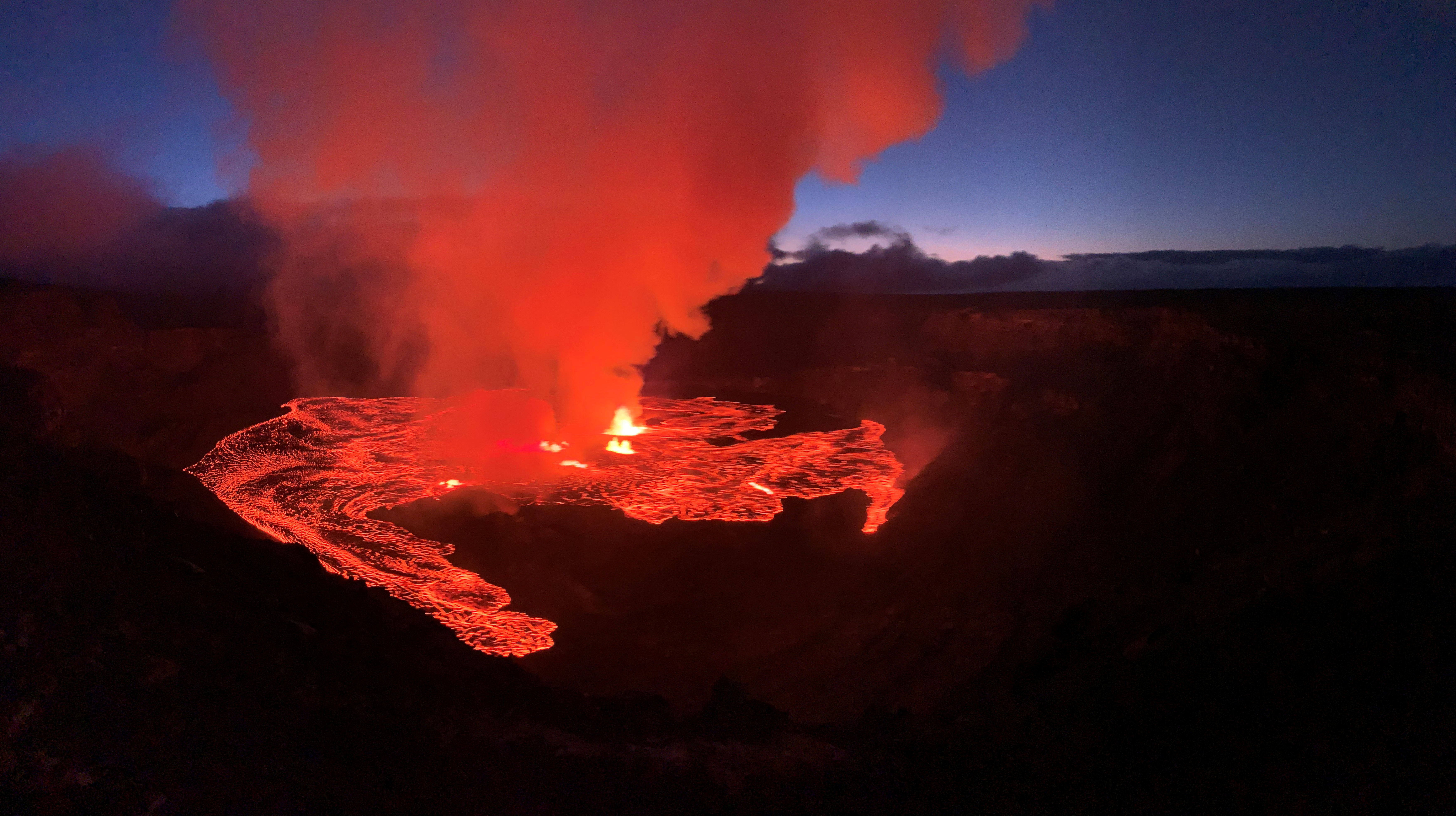 Lava flows on the Halema'uma'u crater floor alongside several active vent sources as the Kilauea volcano erupts in Hawaii, U.S. June 7, 2023. USGS/Handout via REUTERS/File Photo