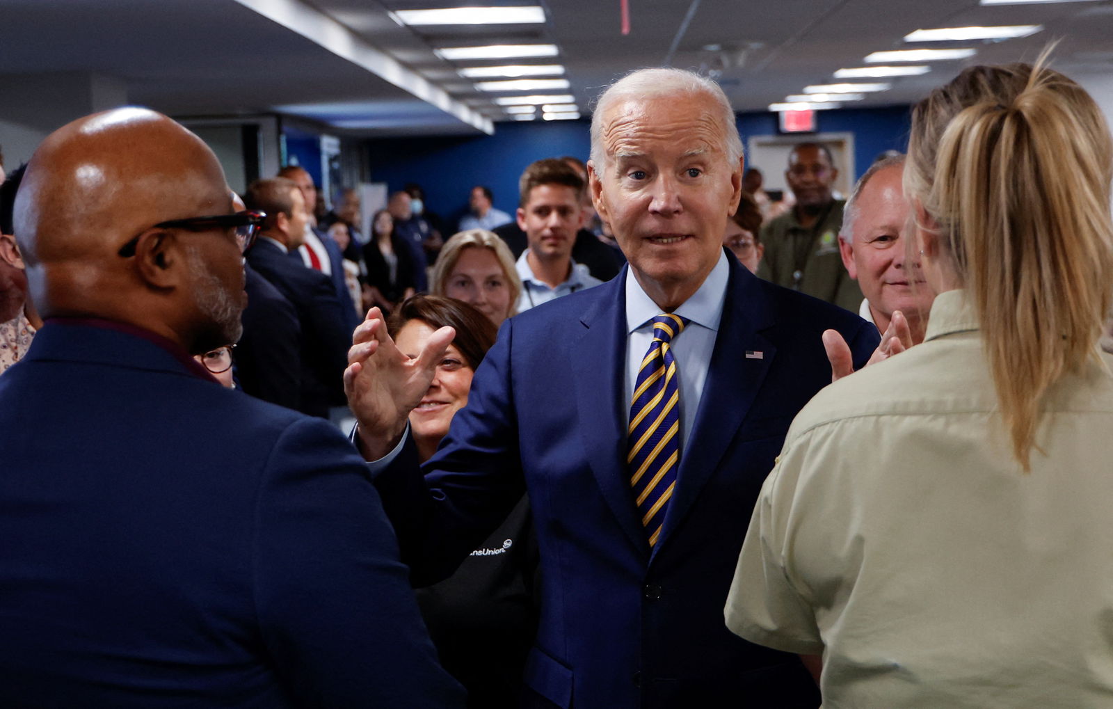 U.S. President Joe Biden speaks with employees of the Federal Emergency Management Agency (FEMA) about their relief efforts for people effected by Hurricane Idalia in Florida and other states, during a visit to the agency in Washington, U.S. August 31, 2023. REUTERS/Jonathan Ernst