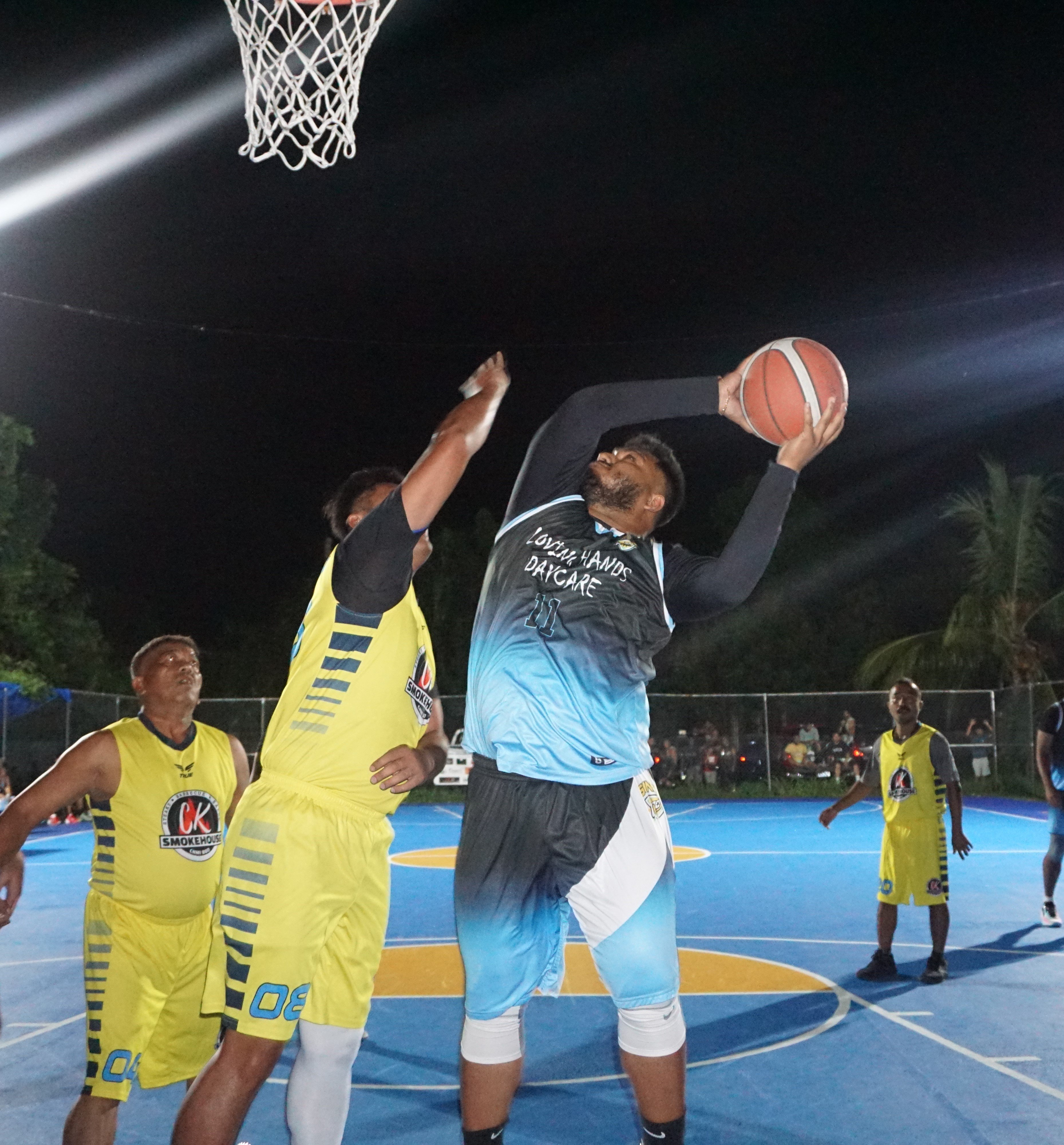 Loving Hands Daycare/670 Sonics' Jun Javier pulls up for the shot from underneath the rim during Sunday's make-up game in the open division of the 2023 Saipan Magalahi Eagles Club Invitational Basketball League at the Gualo Rai basketball court.