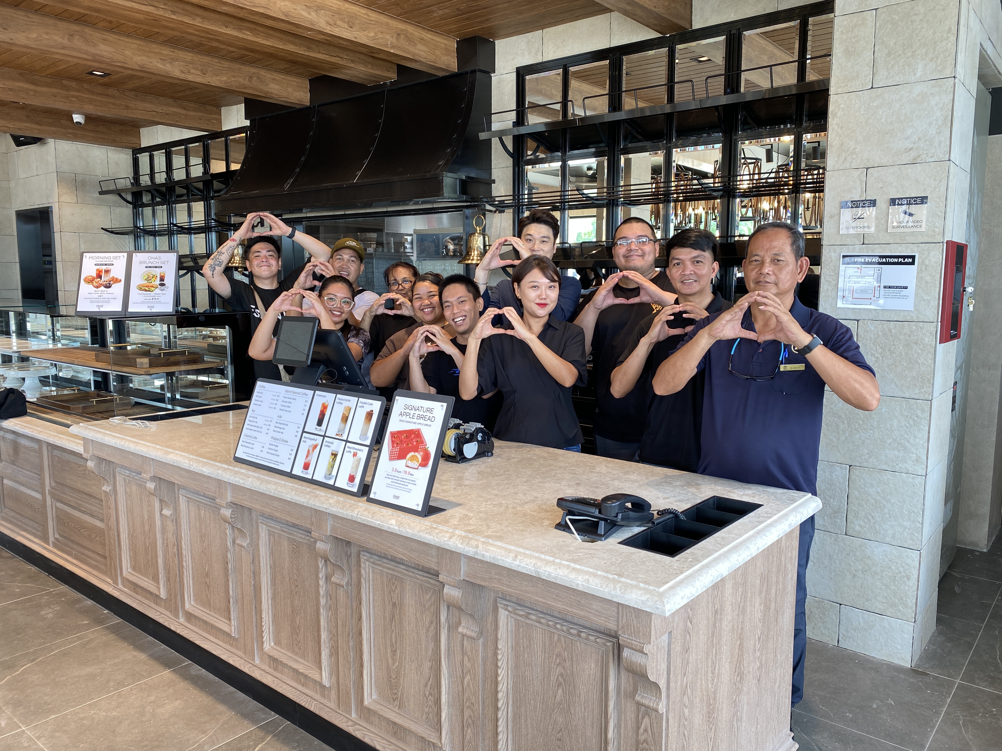 Ohas Boulangerie & Café staff pose for a photo.