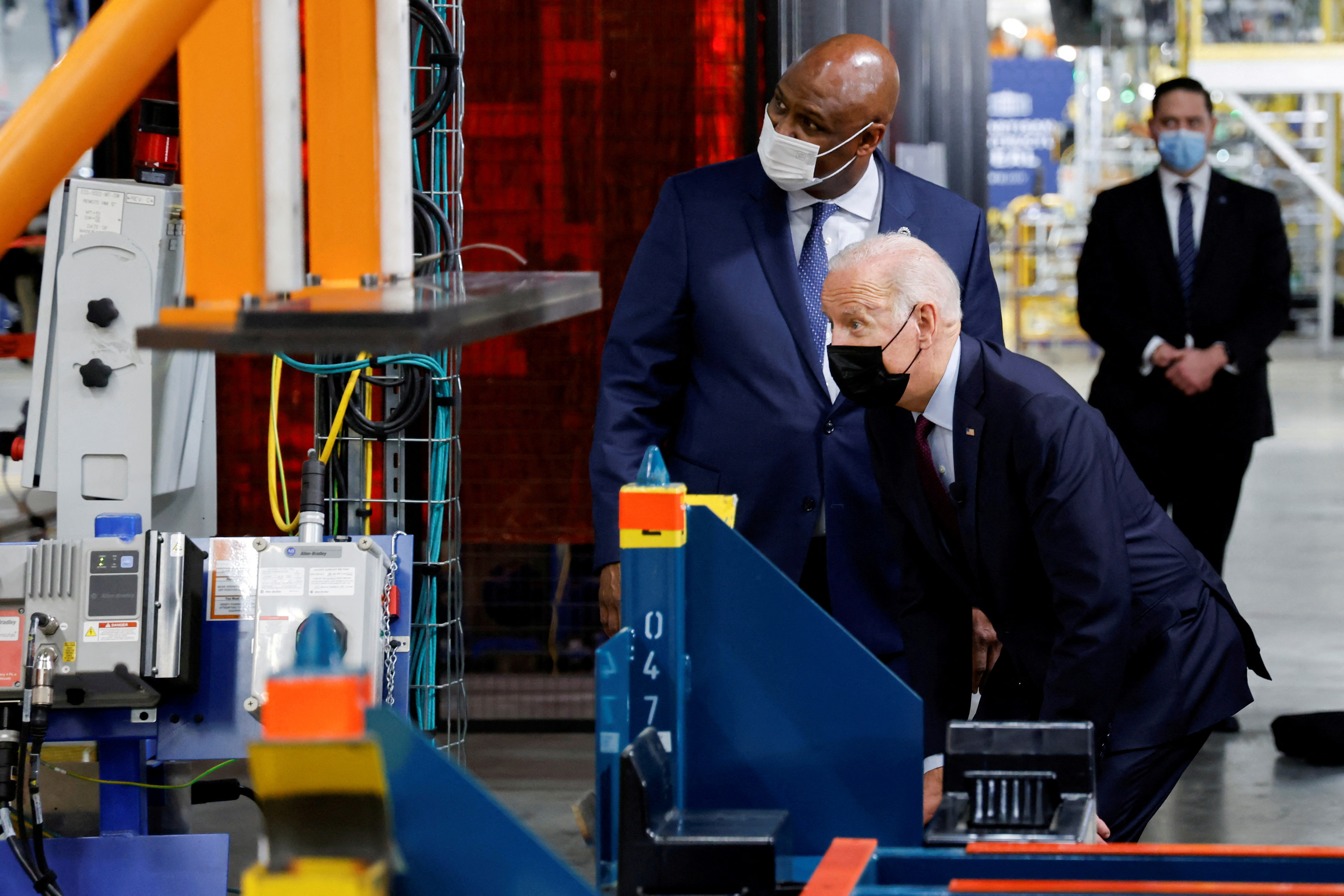 U.S. President Joe Biden visits the production line for the Hummer EV as he tours the General Motors 'Factory ZERO' electric vehicle assembly plant in Detroit, Michigan, U.S. November 17, 2021. 