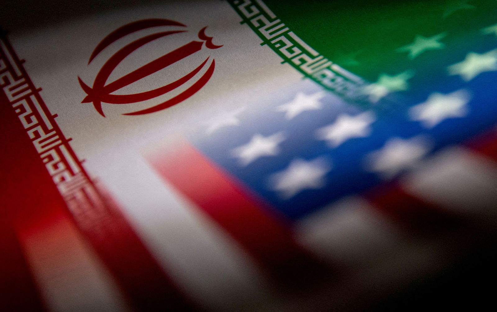 The Iranian and U.S. flags are seen printed on paper in this illustration taken January 27, 2022. 
