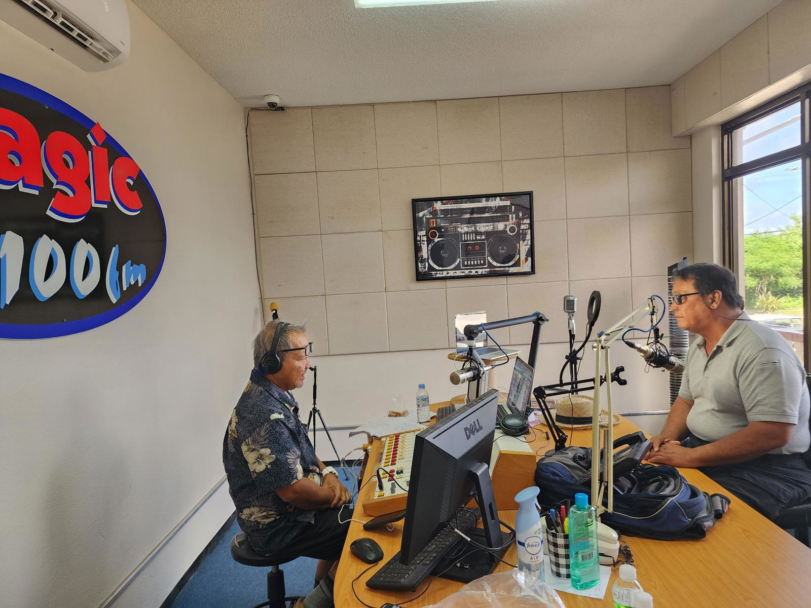 Marianas Agupa talk show host Glenn Manglona, left, interviews Saipan Mayor “RB” Camacho regarding issues with the Department of Public Lands on Saturday.  Camacho also answered questions from listeners.