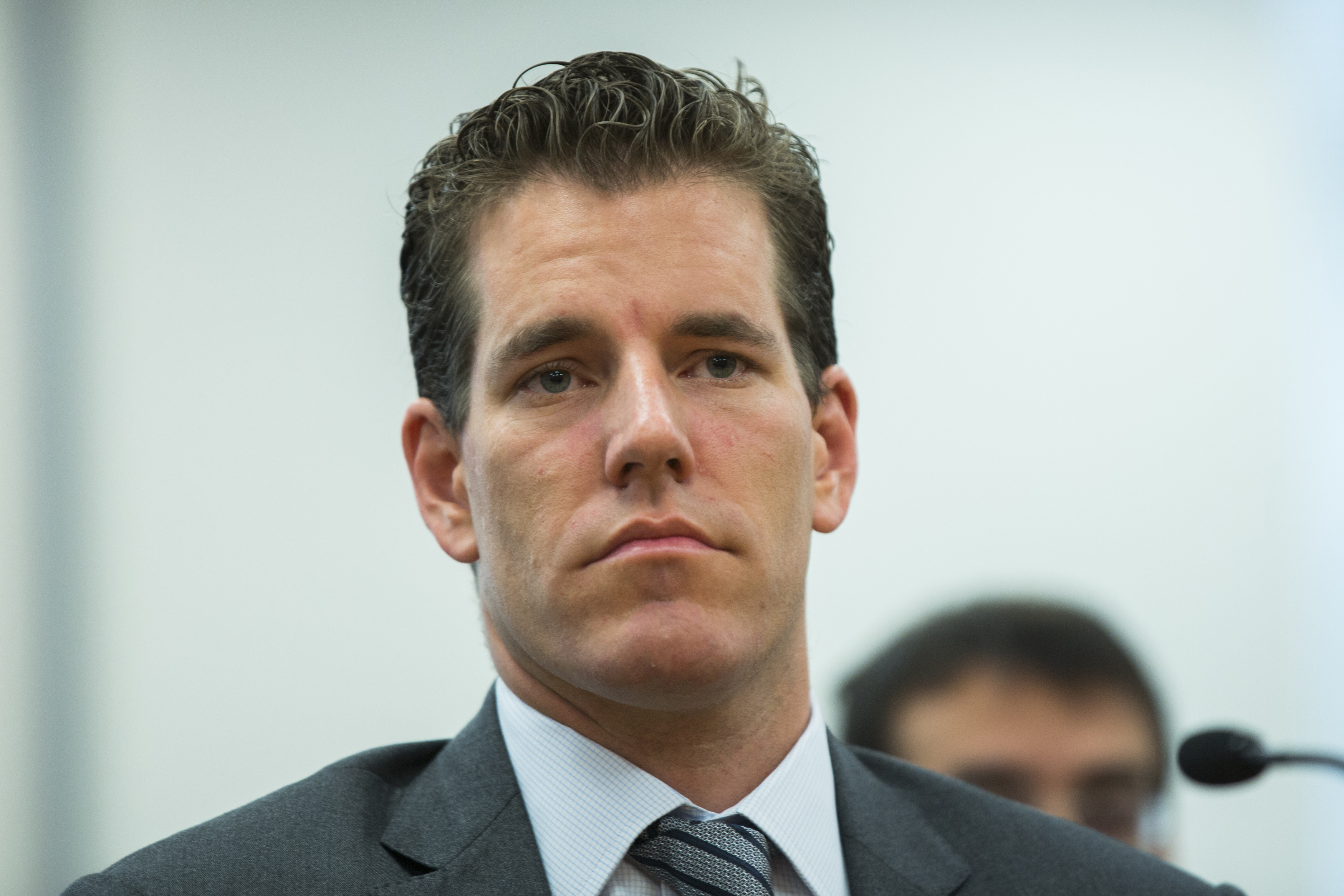 Cameron Winklevoss speaks at a New York State Department of Financial Services (DFS) virtual currency hearing in the Manhattan borough of New York January 28, 2014. REUTERS/Lucas Jackson/file photo