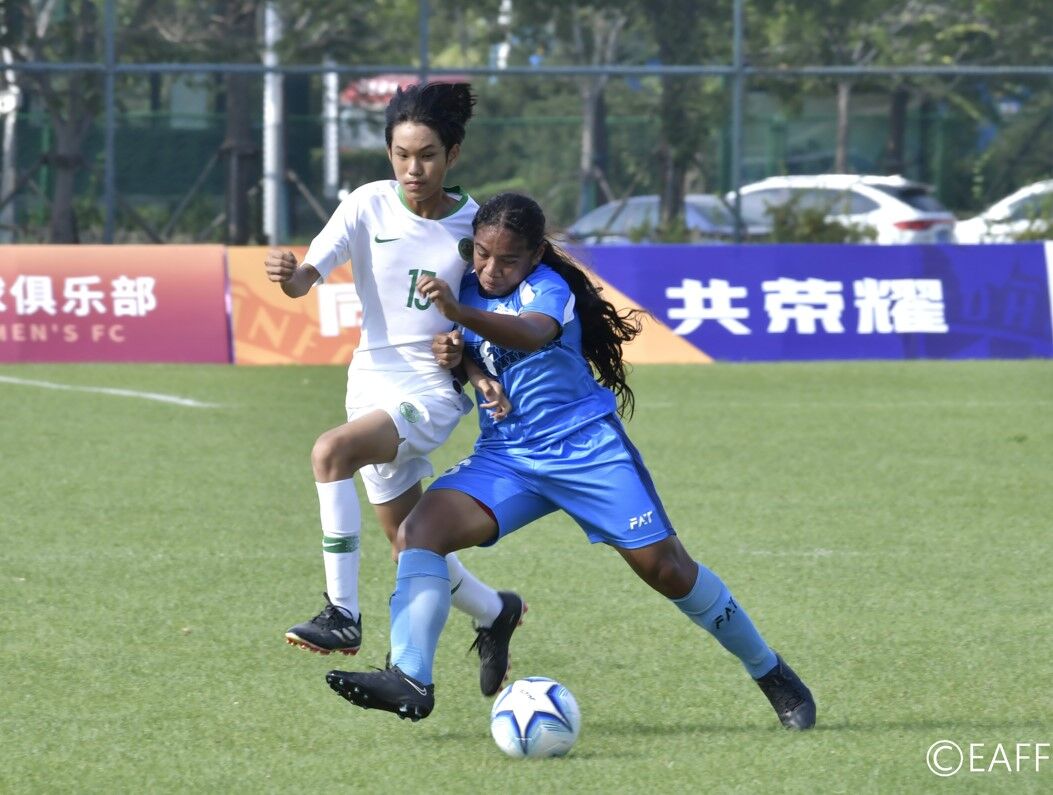 The NMI’s Arstin Tagabuel fights for the possession against Macau in an East Asian Football Federation U15 Men’s Championships game on Saturday at the Qingdao Citizen Fitness Center in Qingdao, China.
