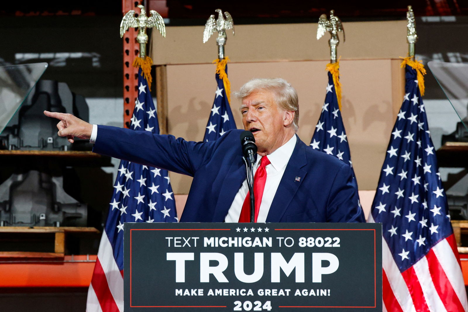 Former U.S. President and Republican presidential candidate Donald Trump addresses auto workers as he skips the second GOP debate, in Clinton Township, Michigan, U.S., September 27, 2023. 