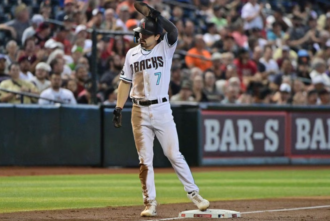Arizona Diamondbacks left fielder Corbin Carroll (7) celebrates after his 50th stolen base of the season in the third inning against the San Francisco Giants at Chase Field in Phoenix, Arizona, Sept. 20, 2023.