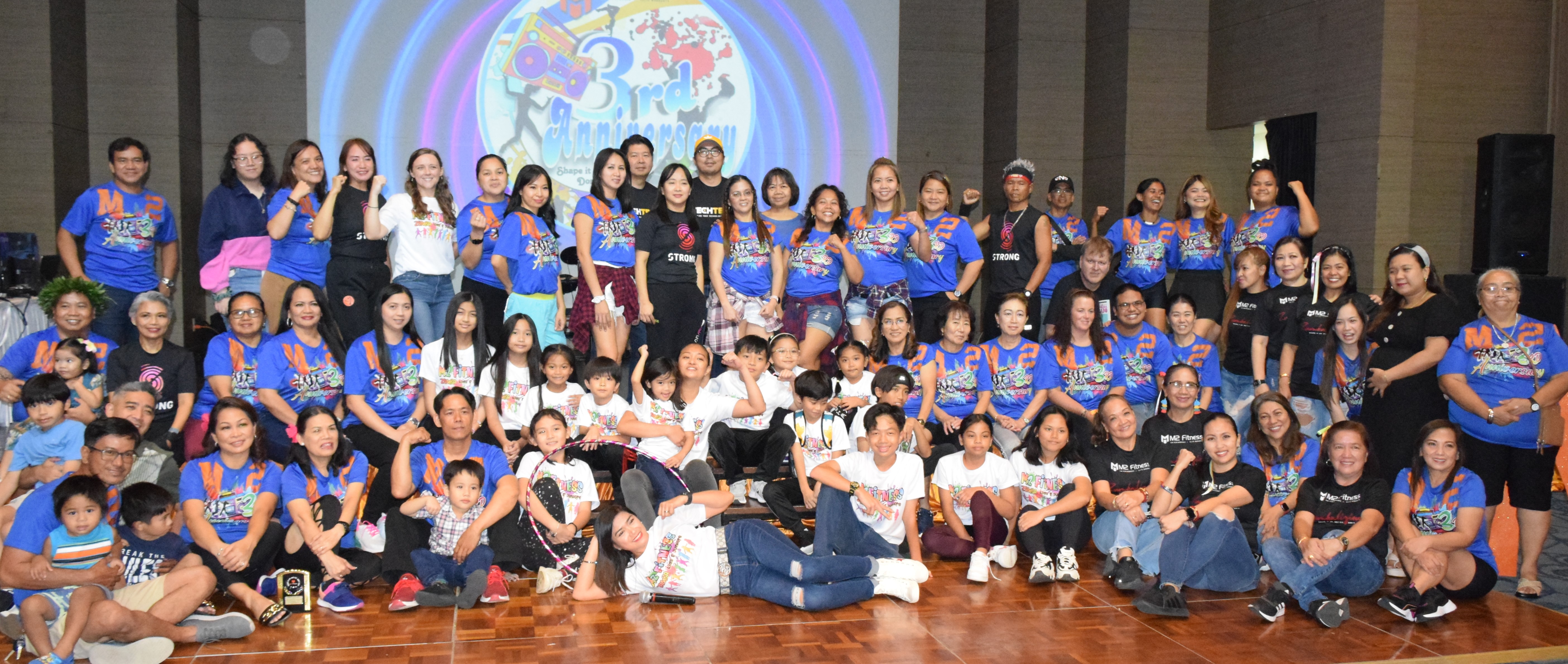 M2 Fitness members gather for group photo at the conclusion of their third anniversary celebration at the Saipan World Resort's Royal Taga Hall on Saturday. 