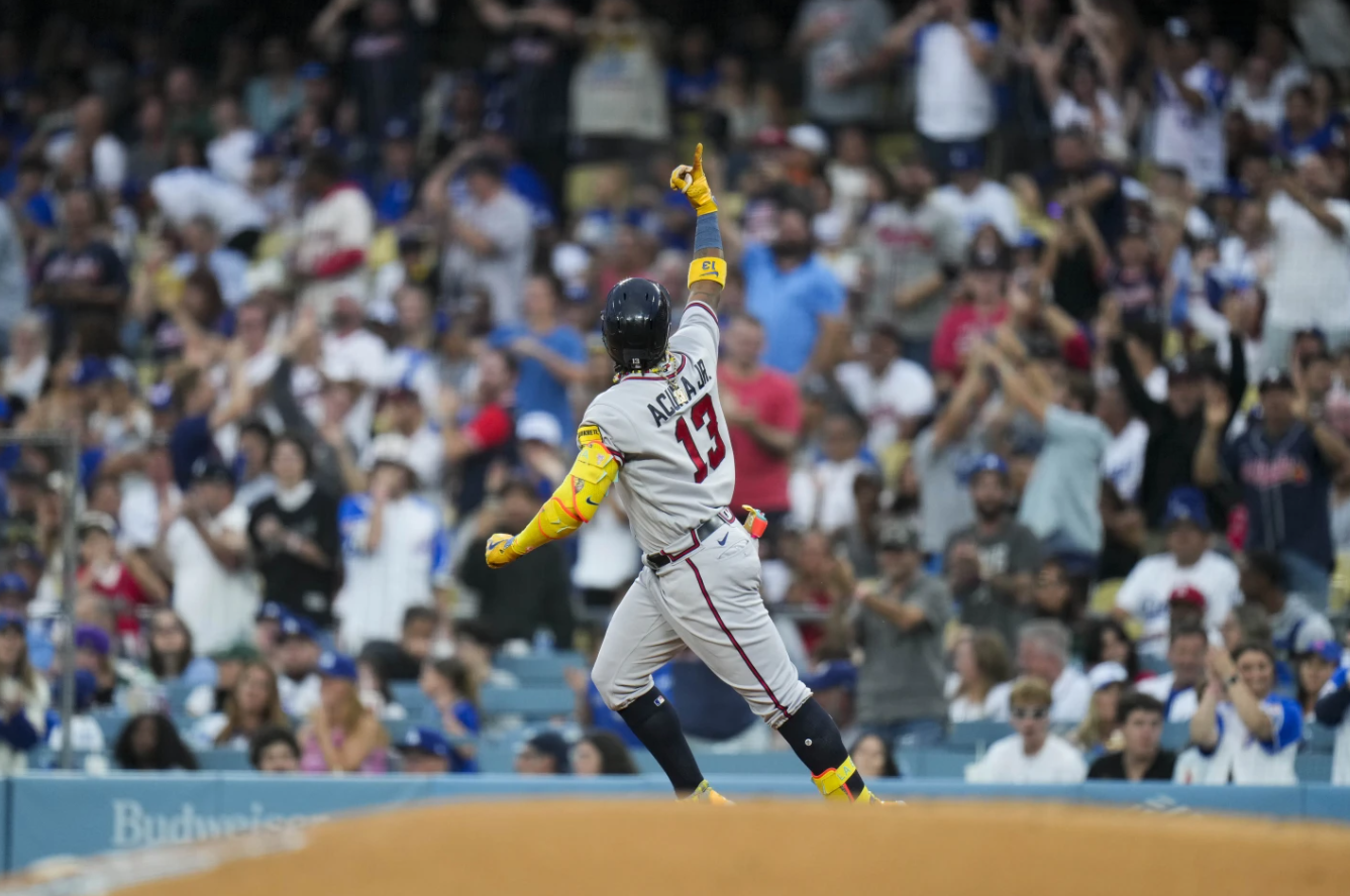 Ronald Acuña Jr. of the Atlanta Braves celebrates his home run against the Los Angeles Dodgers in the third inning of a baseball game Saturday, Sept. 2, 2023, in Los Angeles.