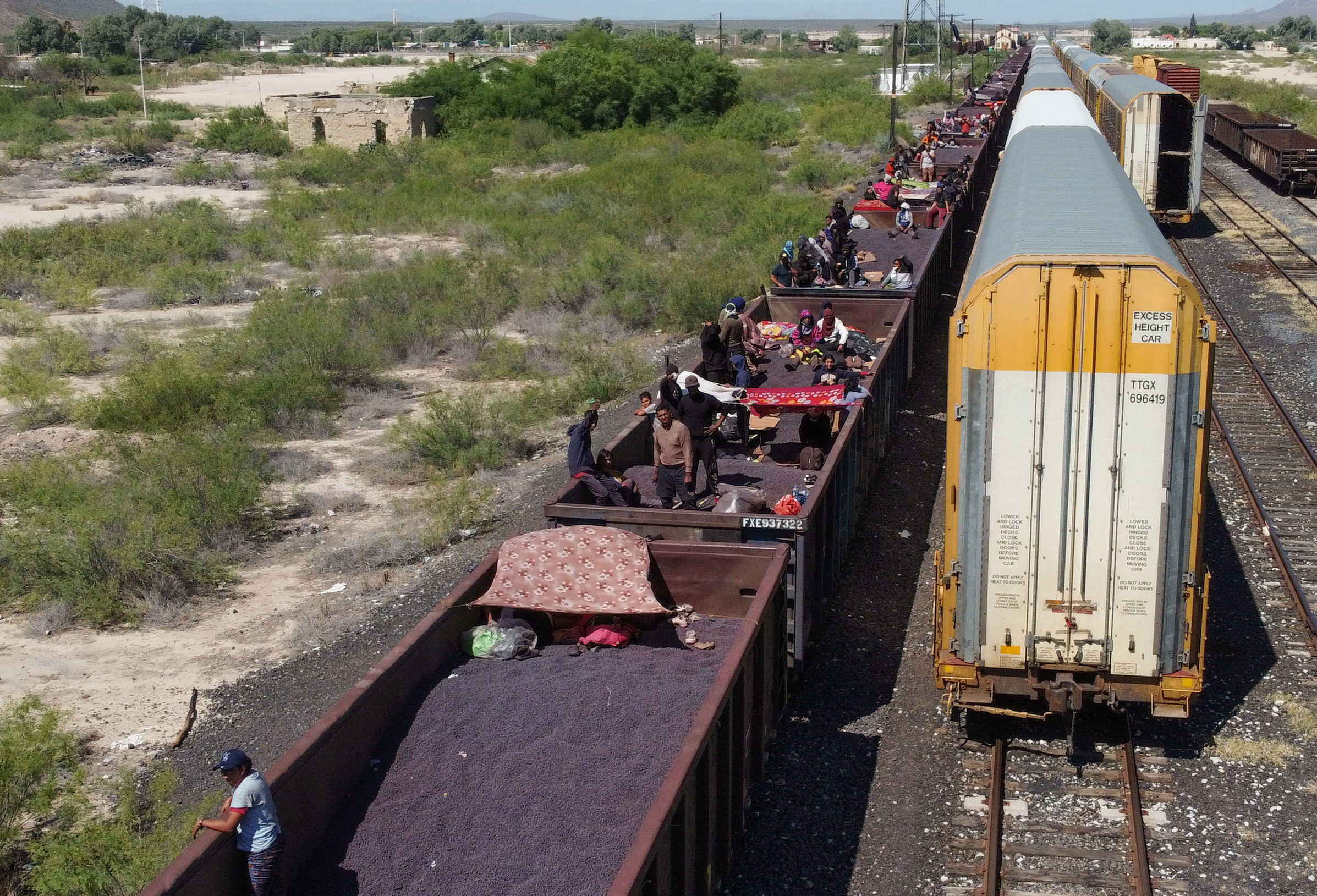 Asylum seekers heading to the U.S. travel aboard a train after thousands of migrants have already crossed into the United States in recent days, in Paredon, Mexico September 21, 2023. 