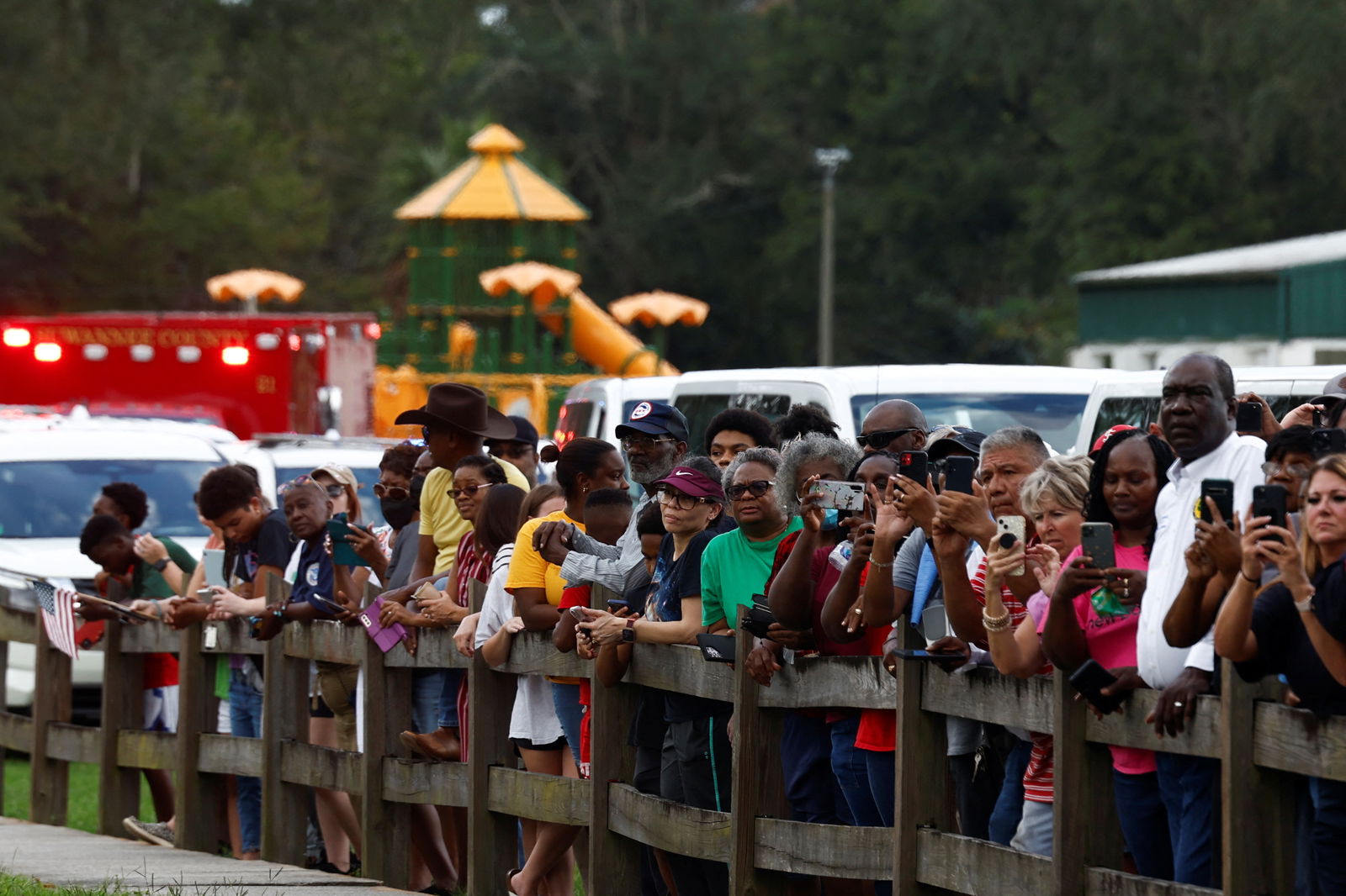 People wait as U.S. President Joe Biden visits Live Oak during his tour of Hurricane Idalia storm destruction, in Live Oak, Florida, U.S., September 2, 2023. REUTERS/Evelyn Hockstein