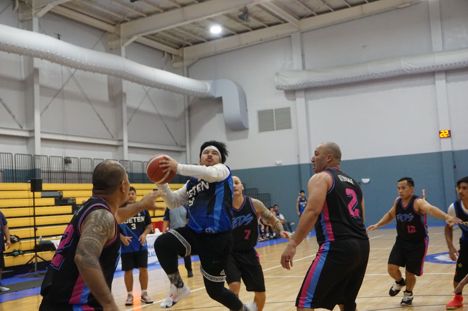 Joeten's John Paul Cruz protects the possession as he goes up for the shot during an opening game of the 2023 R&J Wine and Liquor Inter-Government/Business League on Monday at the Ada gym.