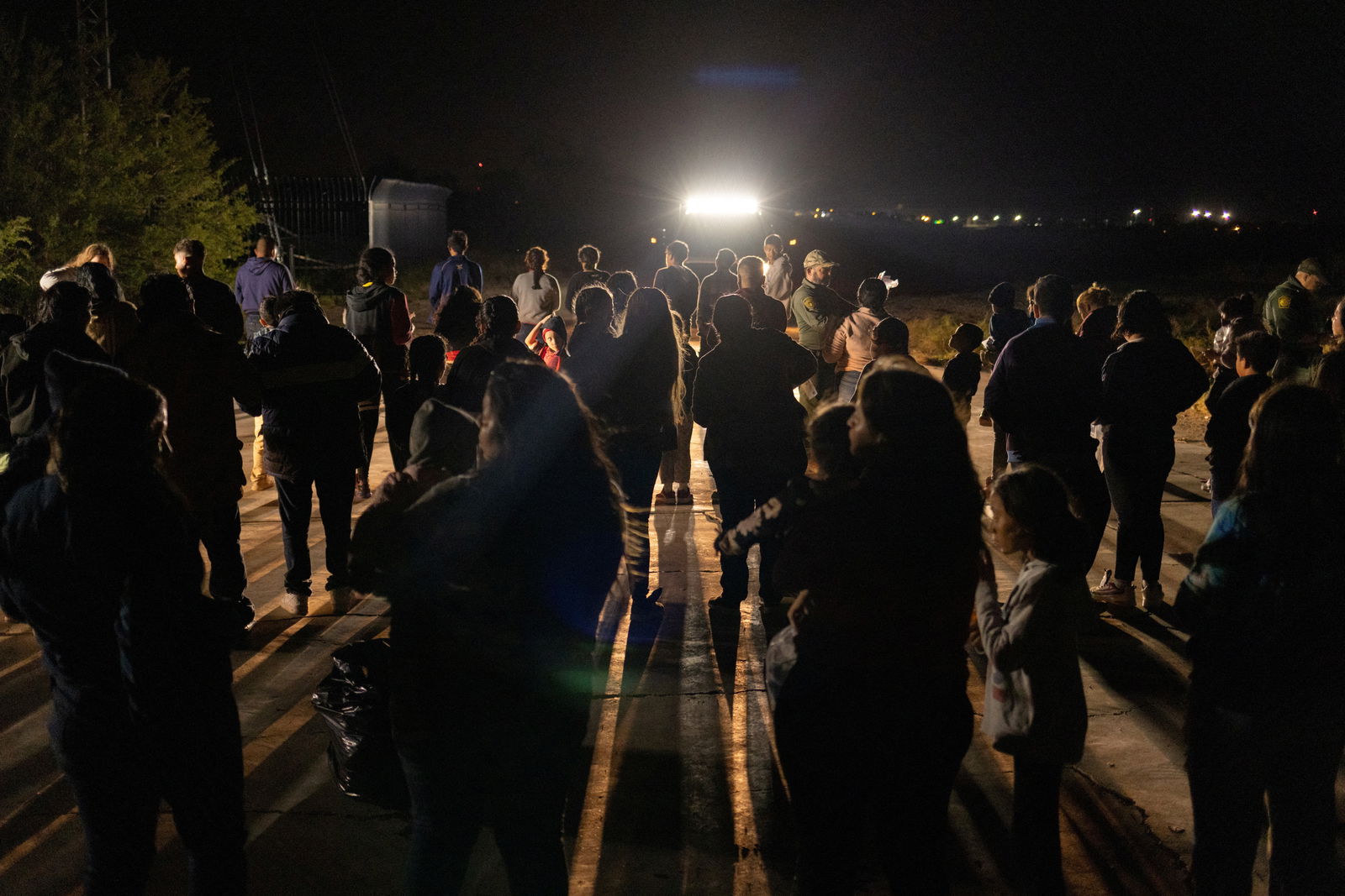 A border patrol agent document migrants, mostly from Guatemala and Honduras, as they surrender after crossing into United States from Mexico in Roma Creek, Texas, U.S. September 20, 2023. 