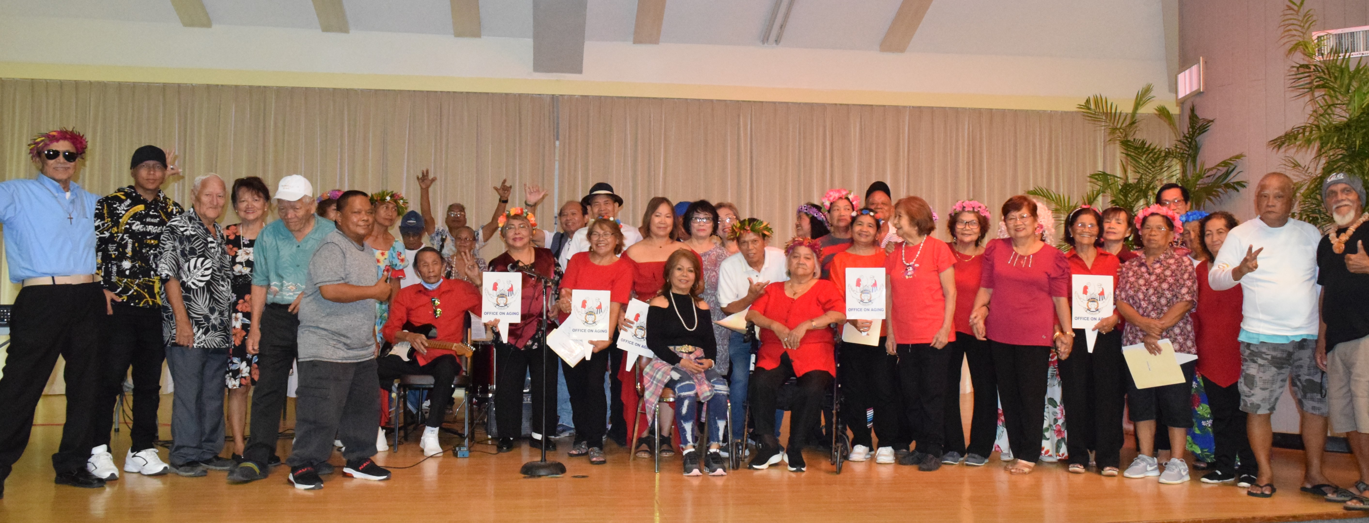 The manamko' pose for a group photo at the conclusion of their concert.