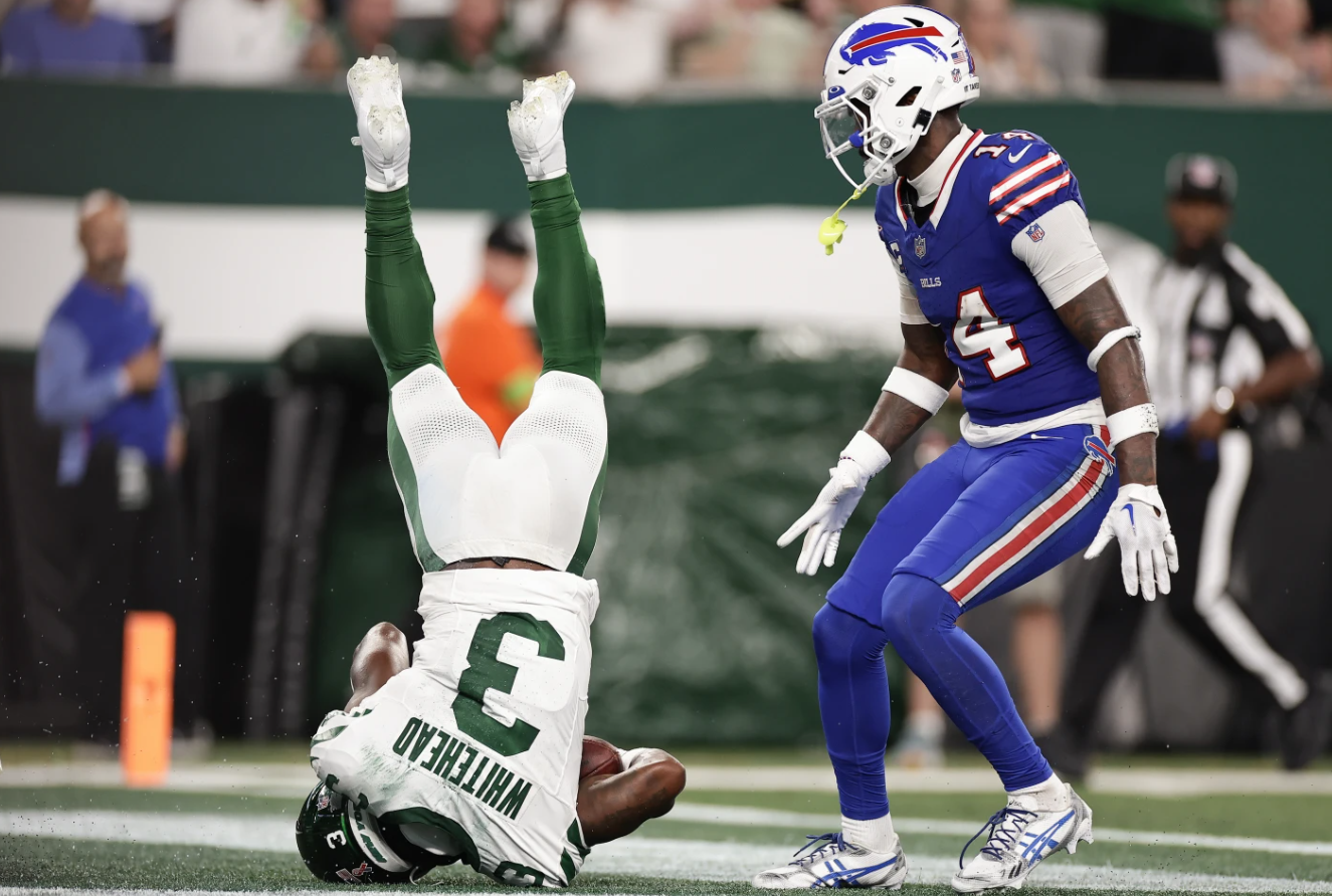 New York Jets safety Jordan Whitehead (3) intercepts a pass in the end zone against the Buffalo Bills wide receiver Stefon Diggs (14) during the third quarter of an NFL football game, Monday, Sept. 11, 2023, in East Rutherford, N.J.