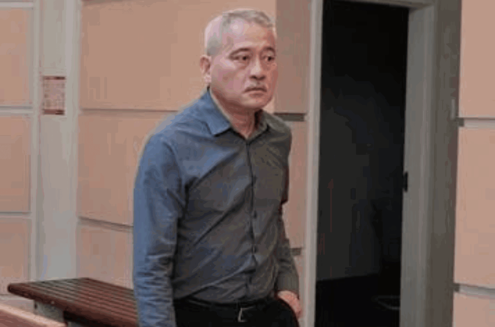 Arthur San Agustin, director of the Department of Public Health and Social Services, arrives ahead of his hearing on Tuesday, Aug. 29, 2023, at the Guam Judicial Center in Hagåtña.