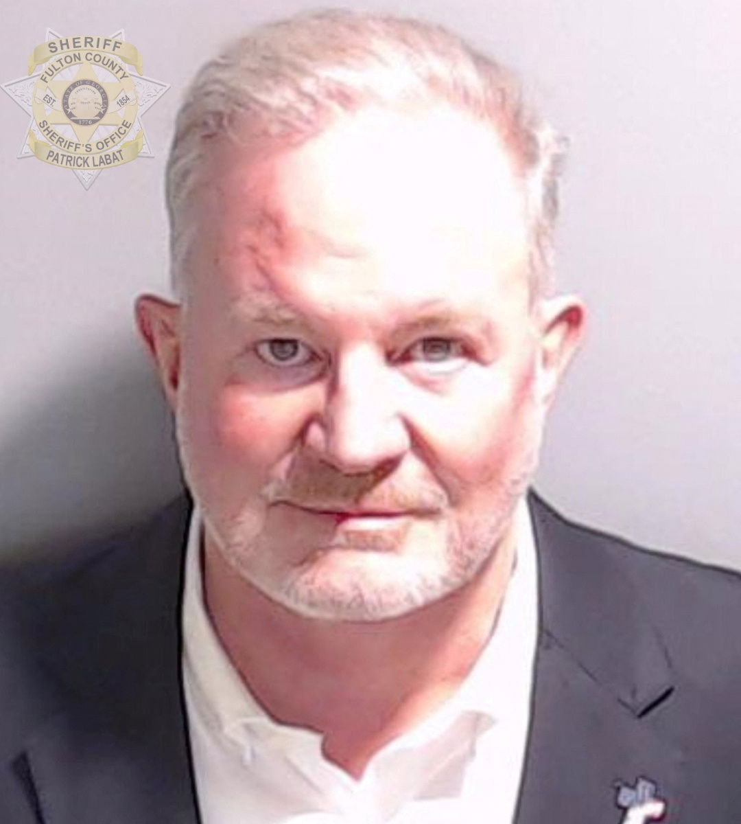 Republican poll watcher Scott Hall is shown in a police booking mugshot released by the Fulton County Sheriff's Office, after a grand jury brought back indictments against former U.S. President Donald Trump and 18 of his allies in their attempt to overturn the state's 2020 election results in Atlanta, Georgia, U.S. August 22, 2023. 