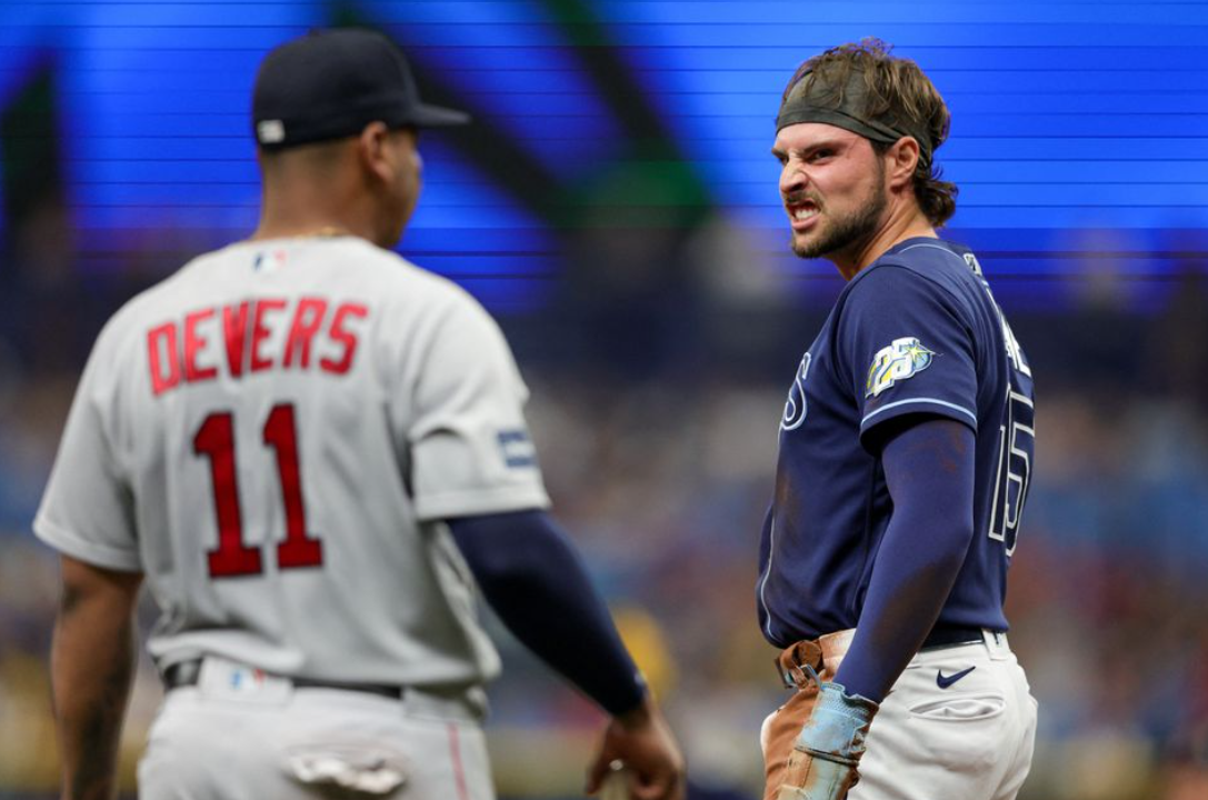 Tampa Bay Rays right fielder Josh Lowe (15) reacts after stealing third base against the Boston Red Sox in the first inning at Tropicana Field in St. Petersburg, Florida, Sept. 4, 2023.