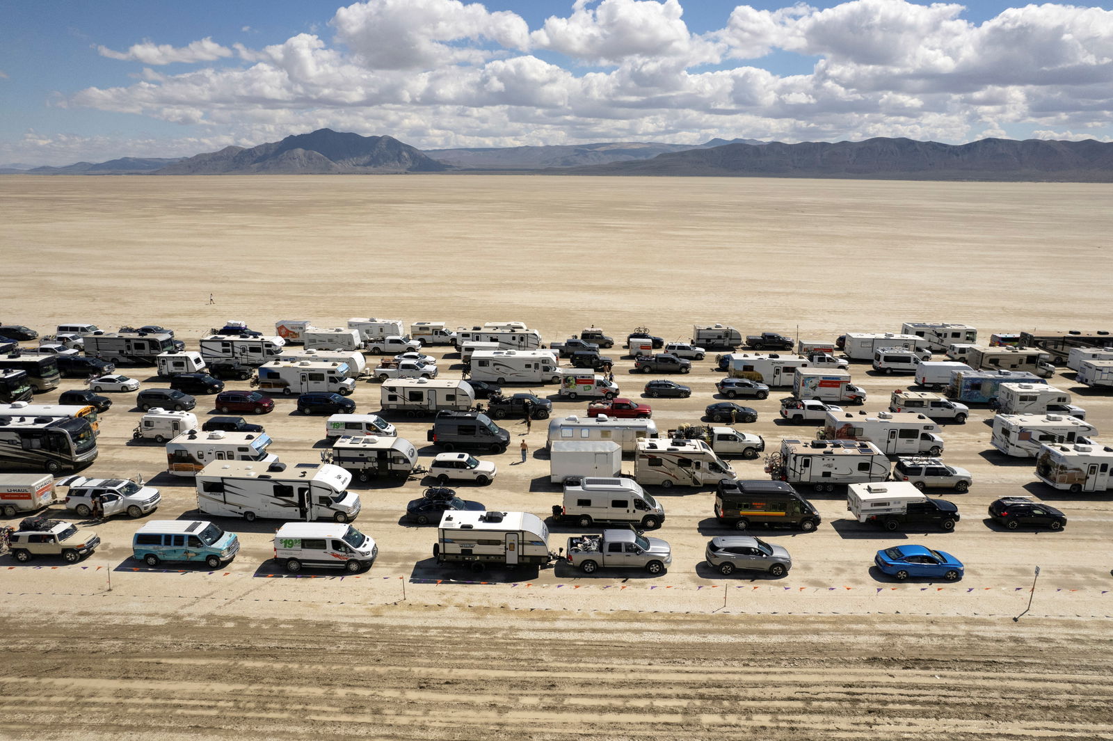 Vehicles are seen departing the Burning Man festival in Black Rock City, Nevada, U.S., September 4, 2023. REUTERS/Matt Mills McKnight