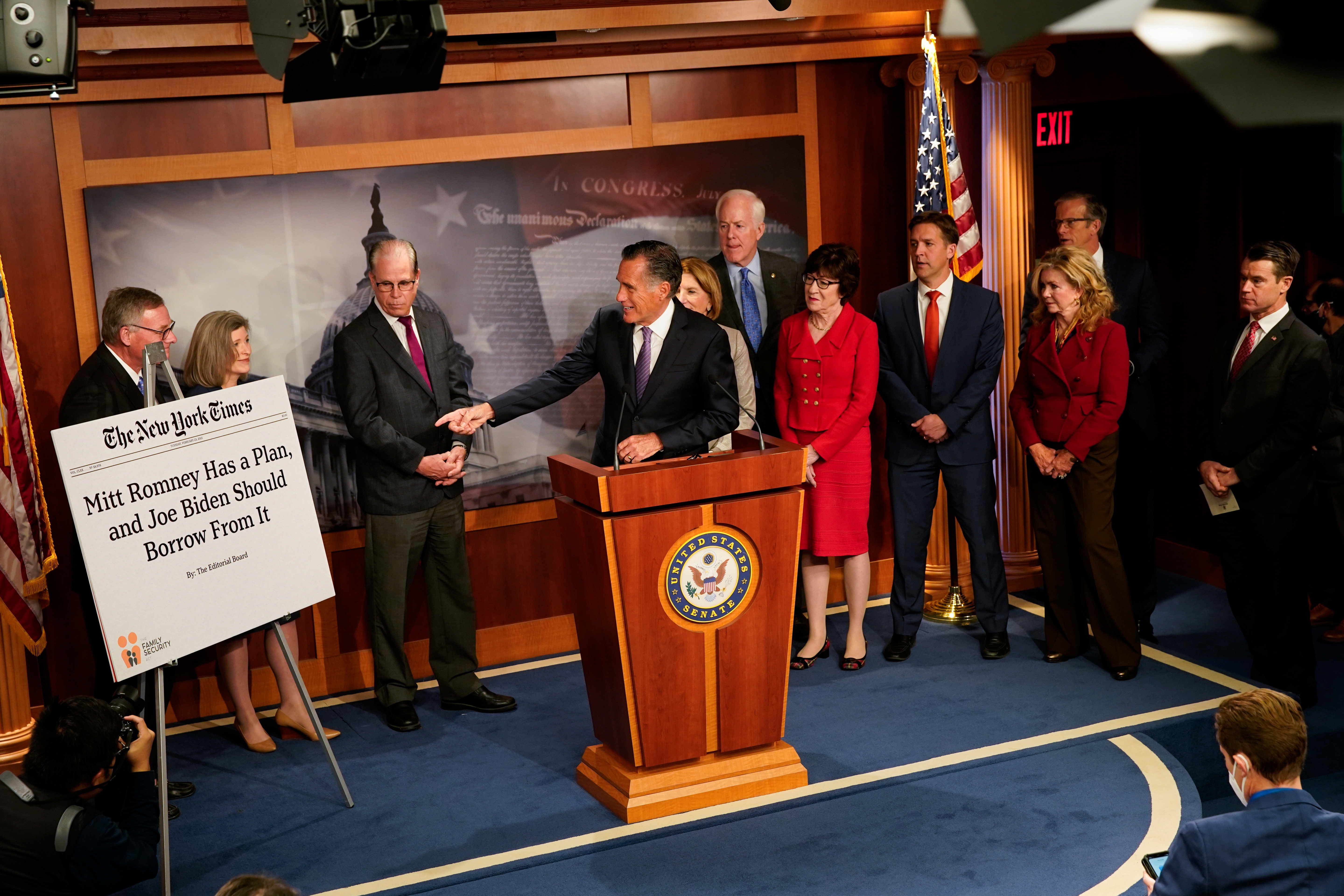 U.S. Senator Mitt Romney (R-UT), flanked by other Republican senators, speaks to reporters about child care and President Joe Biden's $1.75 trillion domestic investment bill during a news conference at the U.S. Capitol in Washington, U.S., December 15, 2021. REUTERS/Elizabeth Frantz/File Photo