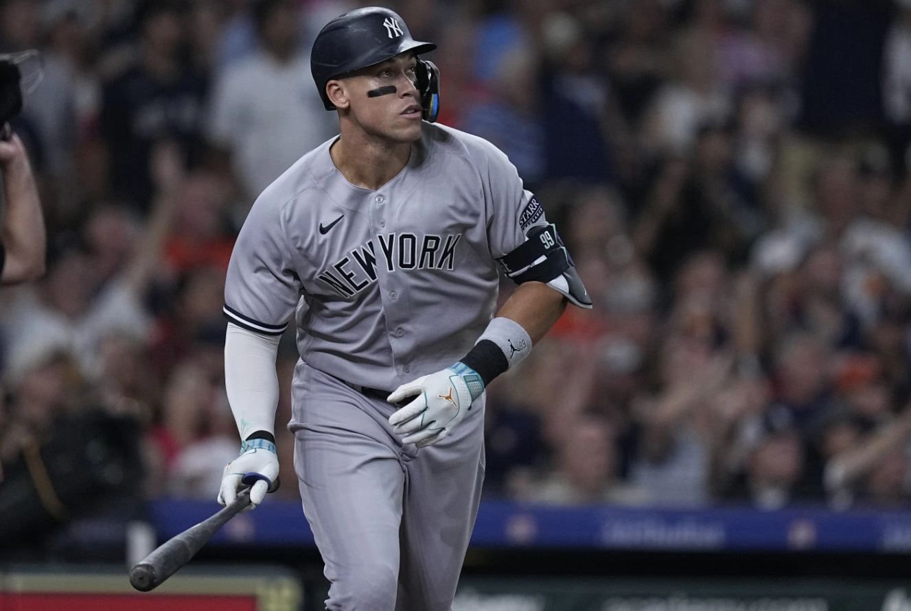 Aaron Judge of the New York Yankees watches his home run against the Houston Astros in the third inning of a baseball game Saturday, Sept. 2, 2023, in Houston.