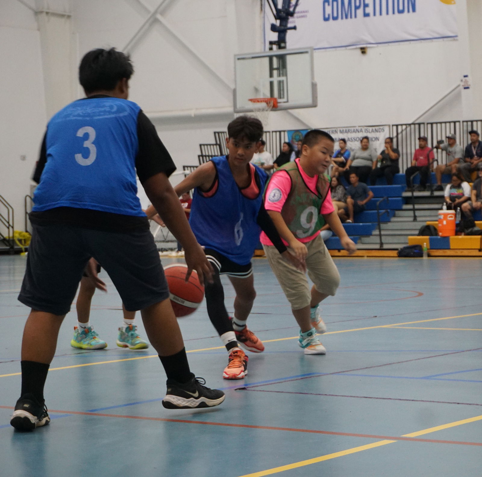 Dandan Middle School's Edward Manibusan steals the ball from a Mount Carmel School player during a boys middle school division game of the IT&E Interscholastic Basketball League SY 23-24 on Wednesday at the Marianas High School gym.