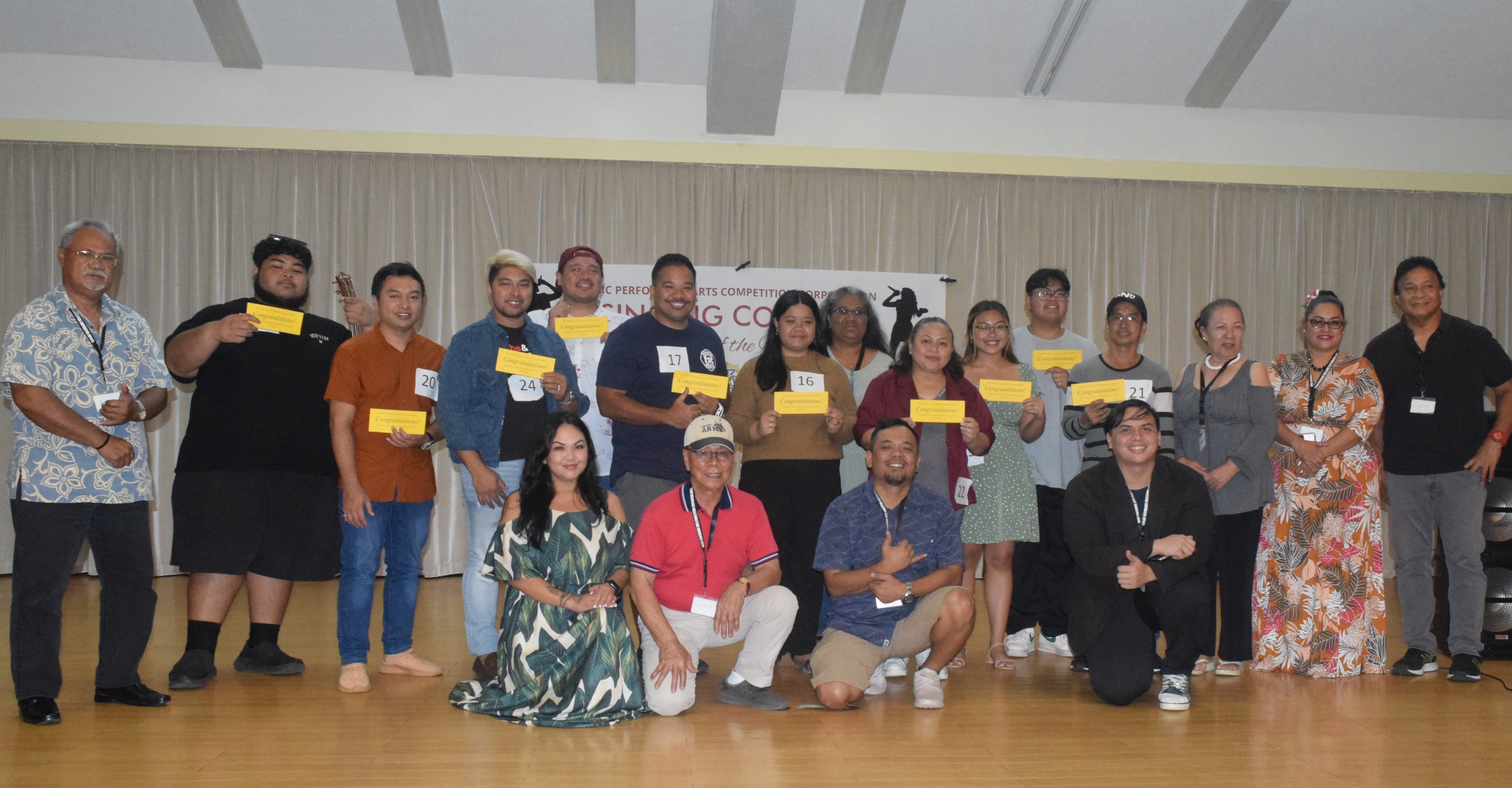 The new contestants of the Battle of Voices pose for a photo with the competition judges and Music Performing Arts Competition Corp. board members  at the Gov. Pedro P. Tenorio Multi-purpose Center on Saturday.
