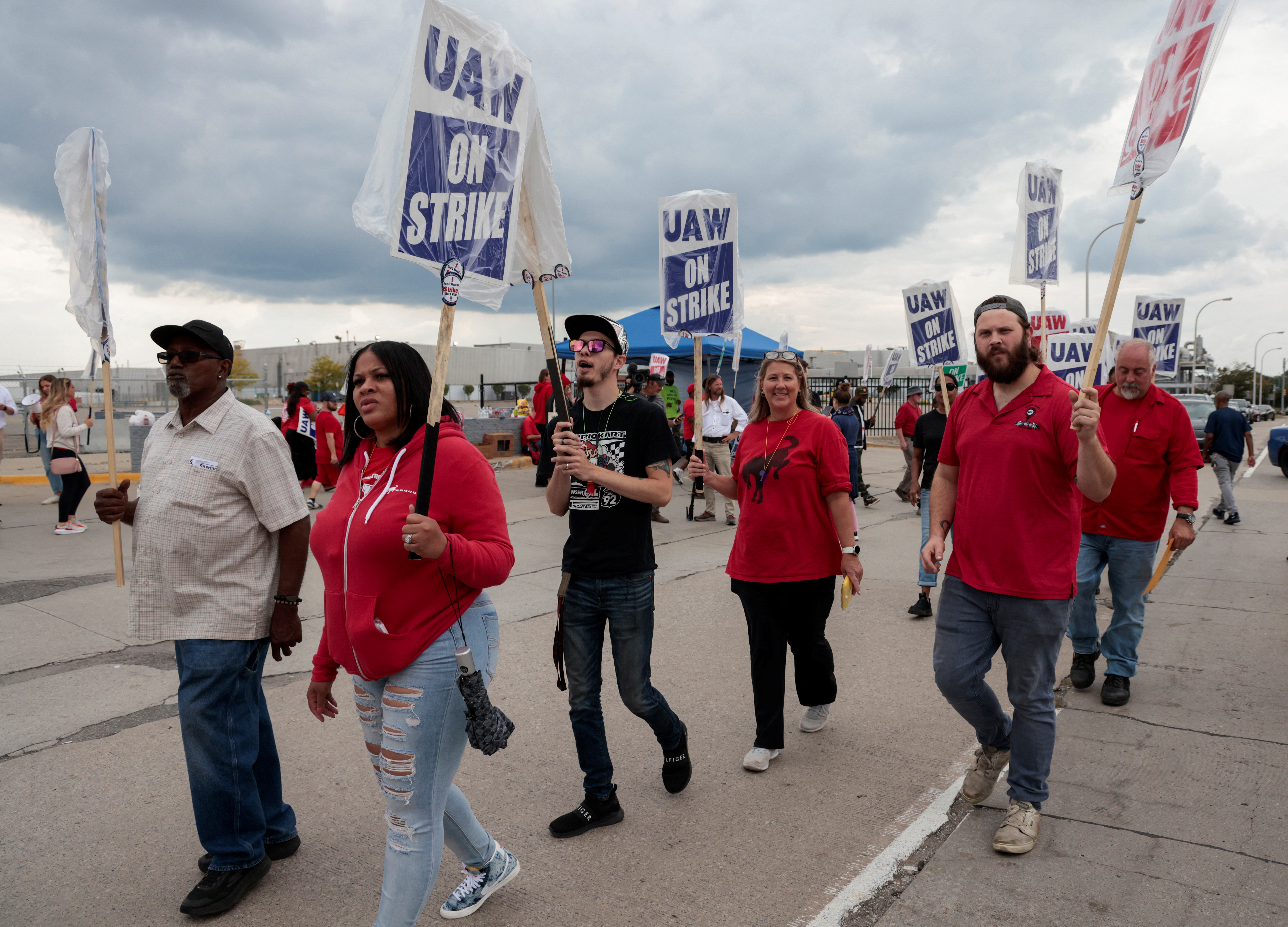 Striking United Auto Workers walk the picket line outside the Ford Michigan Assembly Plant in Wayne, Michigan, Sept. 17, 2023.