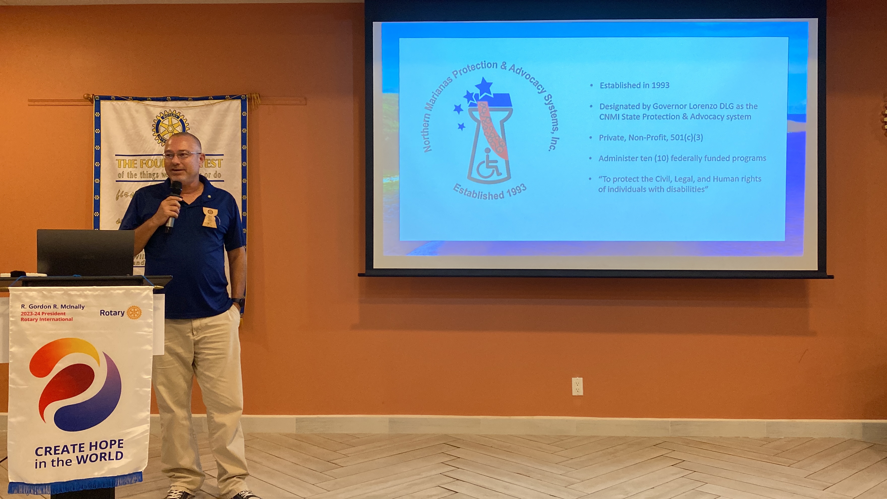 Rotarian Greg Borja, executive director of Northern Marianas Protection and Advocacy Systems Inc., talks about NMPASI during the Sept. 19 meeting of the Rotary Club of Saipan at Crowne Plaza Resort.