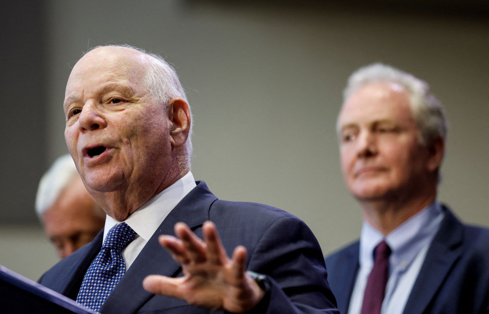 U.S. Senator Senator Ben Cardin (D-MD) is flanked by U.S. Rep. Steny Hoyer (D-MD) and Sen. Chris Van Hollen (D-MD), as he delivers introductory remarks before U.S. President Joe Biden was scheduled to speak about his economic agenda at Prince George's Community College in Largo, Maryland, U.S. September 14, 2023. 