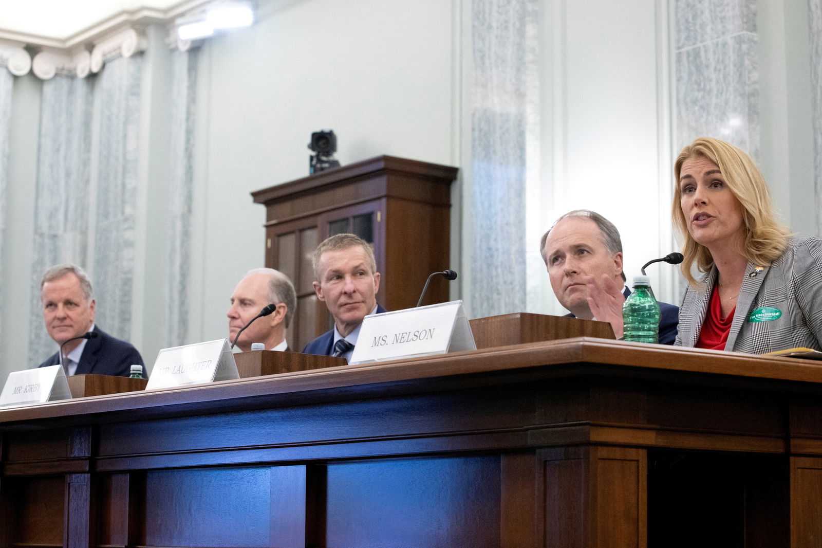 Doug Parker, chairman and chief executive officer of American Airlines Group Inc., Gary Kelly, chief executive officer of Southwest Airlines Co., Scott Kirby, president of United Airlines Holdings Inc., John Laughter, executive vice president and chief of operations at Delta Air Lines Inc., and Sara Nelson, international president of the Association of Flight Attendants-CWA, testify during a Senate Commerce, Science, and Transportation oversight hearing on Capitol Hill in Washington, D.C., December 15, 2021.