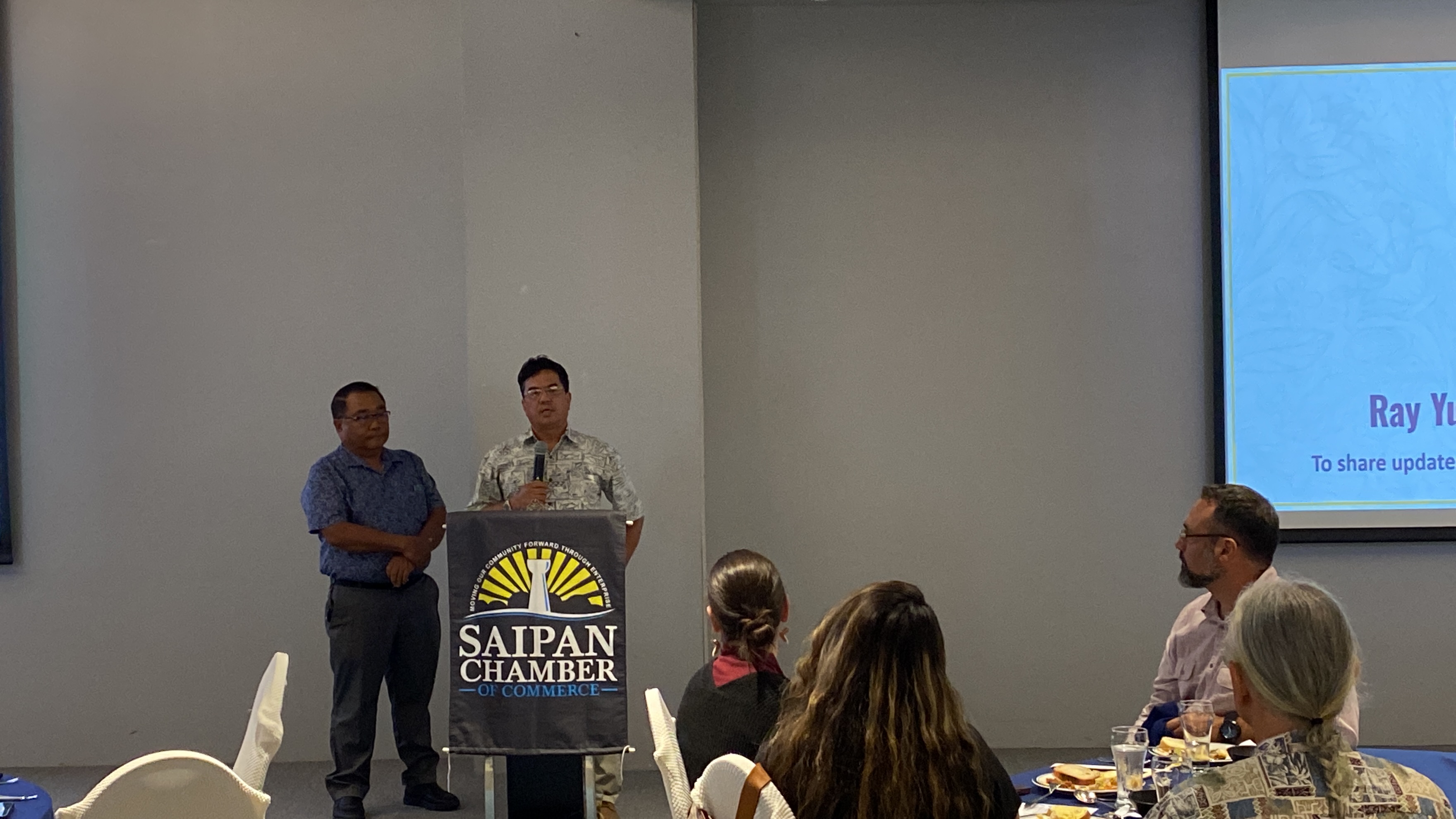 From left, Henry Bautista, Department of Public Works senior highway engineer, and Ray Yumul, DPW secretary.