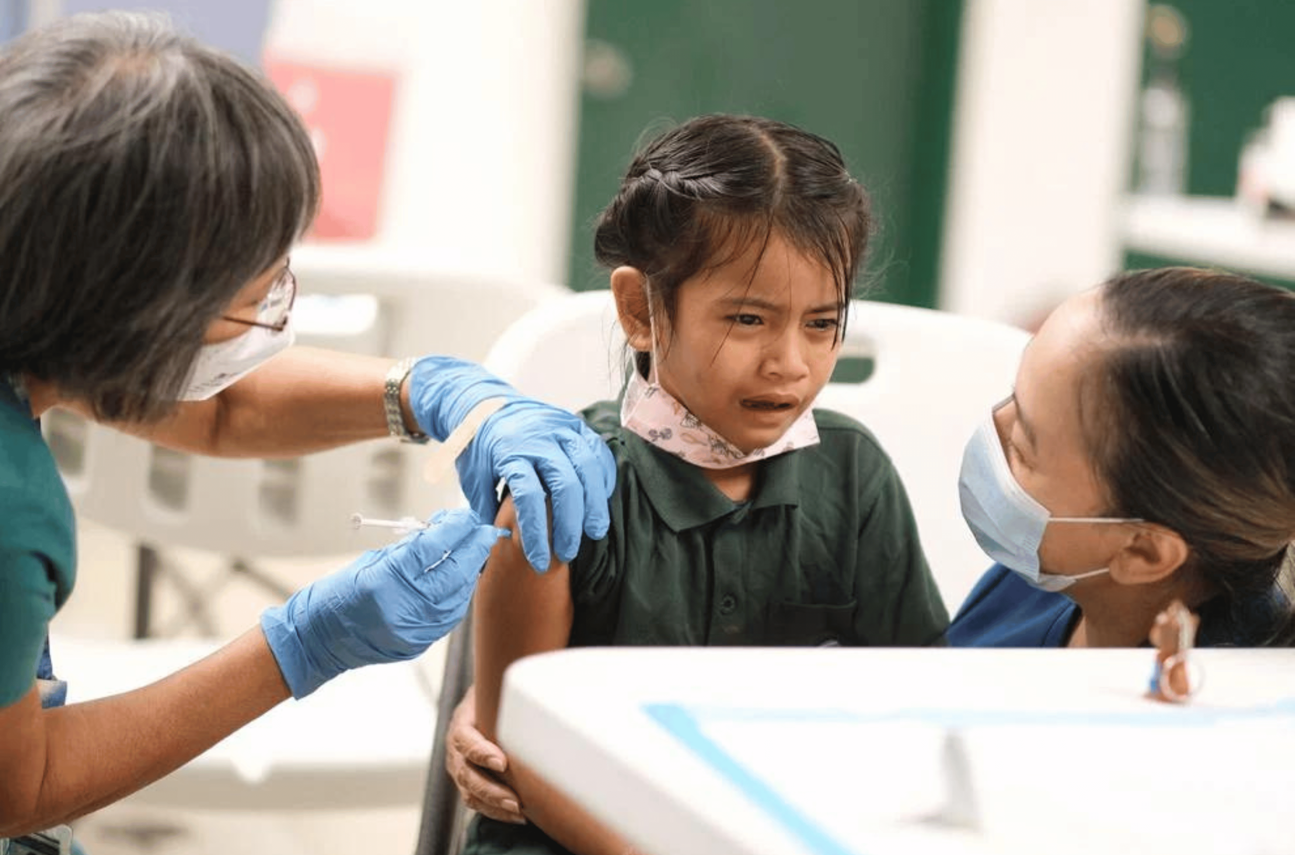 Students at Finegayan Elementary School are administered the flu vaccine during a vaccine clinic at the Dededo campus in November 2022. September marks the start of flu season, according to the Department of Public Health and Social Services. 