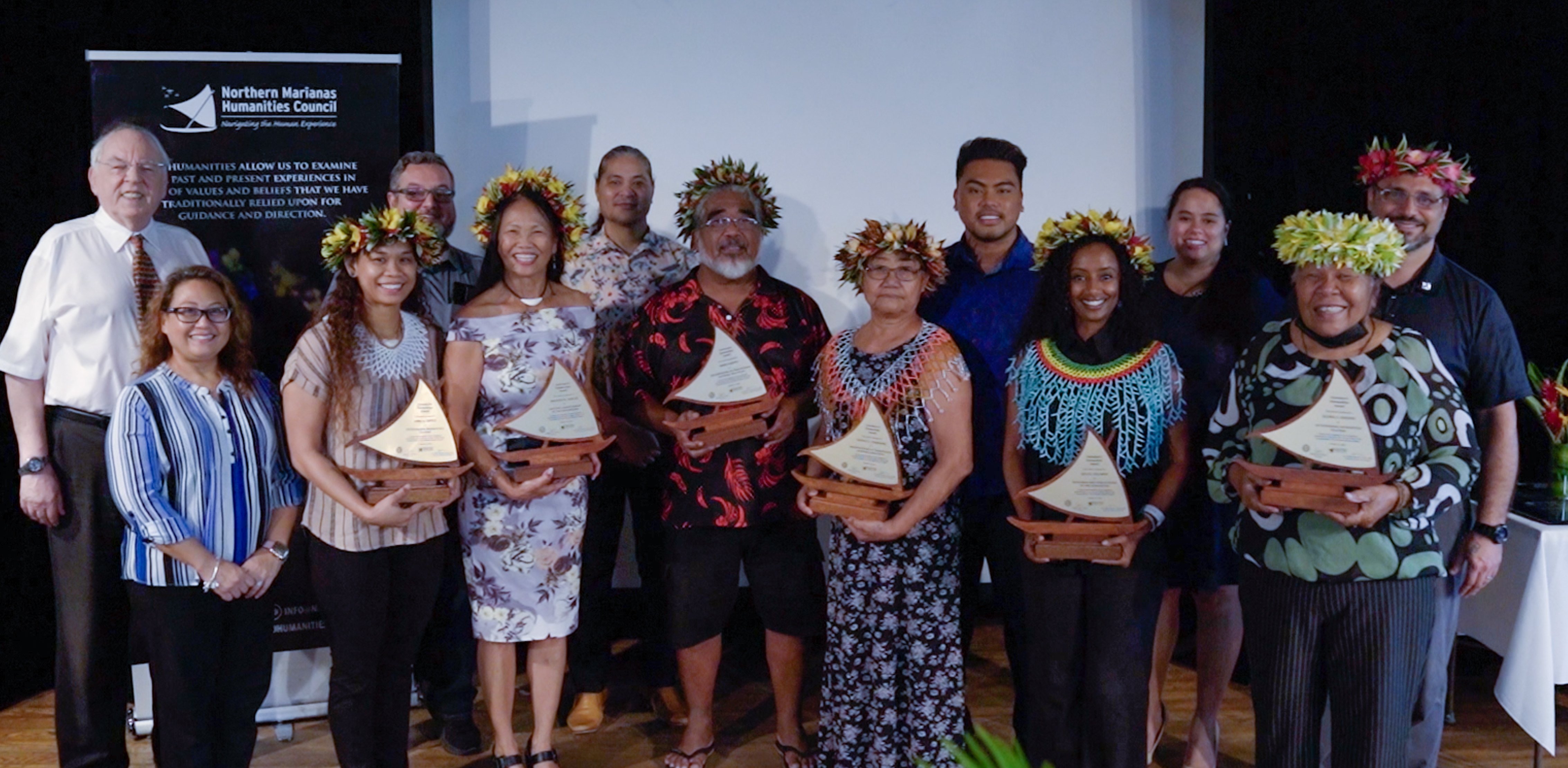 Last year's winners of the Governor's Humanities Award: front row, second from left, April Repeki, Outstanding Humanities Teacher (non-classroom); Frances Sablan, Lifetime Achievement in the Humanities; Master Navigator Mario Benito, Preservation of Traditional Cultural Practices; Sofina Tomokane, Preservation of Traditional Cultural Practices; Beylul Solomon, Research and Publications in the Humanities. Not pictured: Gloria Rasiang, Outstanding Humanities Teacher (in a classroom setting).