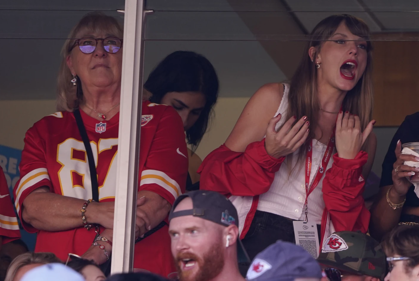 Taylor Swift, right, watches from a suite alongside Travis Kelce’s mother, Donna Kelce, inside Arrowhead Stadium during the first half of an NFL football game between the Chicago Bears and the Kansas City Chiefs Sunday, Sept. 24, 2023, in Kansas City, Mo.