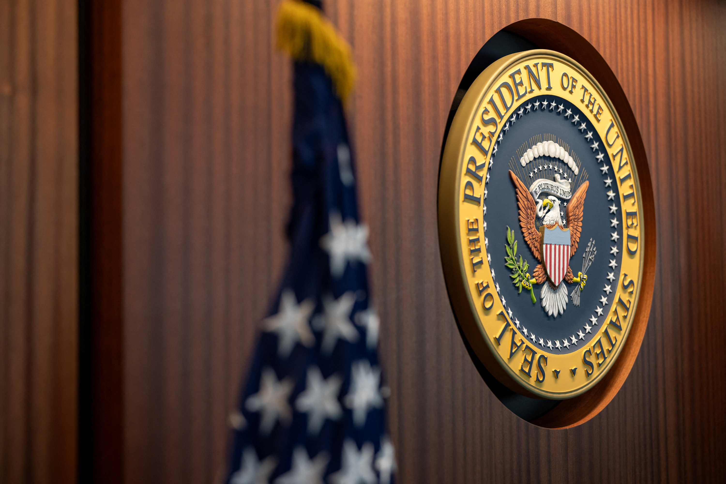 The U.S. Presidential Seal is seen mounted on a wall of the newly renovated White House Situation Room, in a White House handout photo taken in the West Wing of the White House in Washington. U.S. August 16, 2023. Carlos Fyfe/The White House/Handout via REUTERS/File Photo
