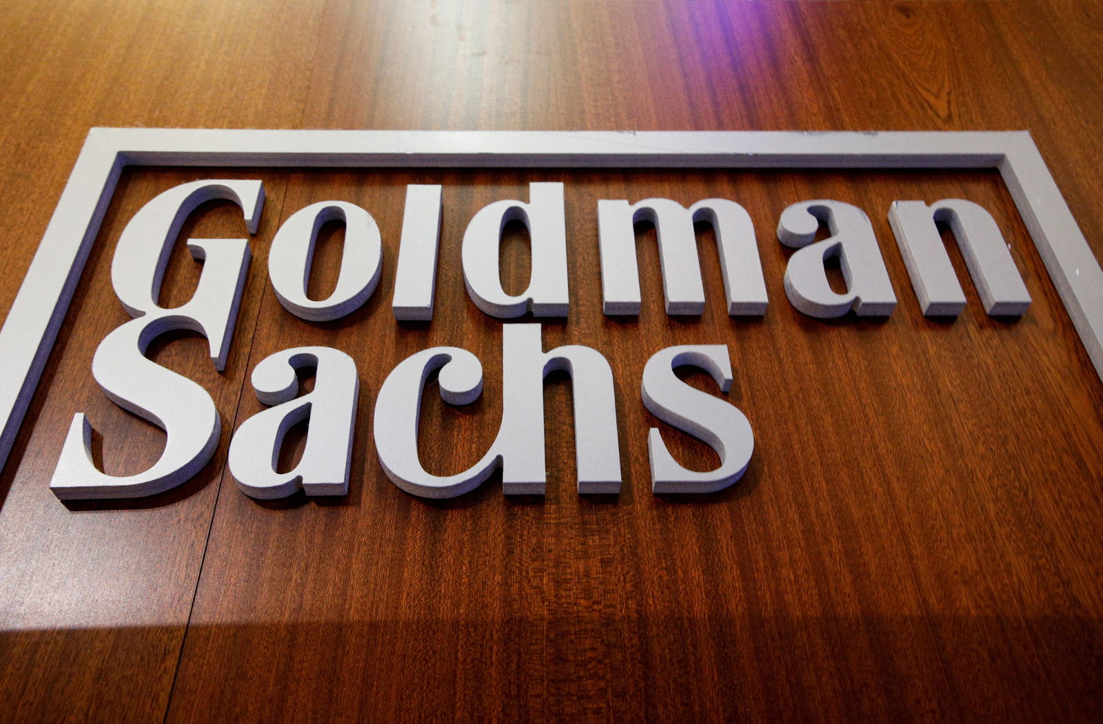 The Goldman Sachs company logo is on the floor of the New York Stock Exchange (NYSE) in New York City, U.S., July 13, 2021. 