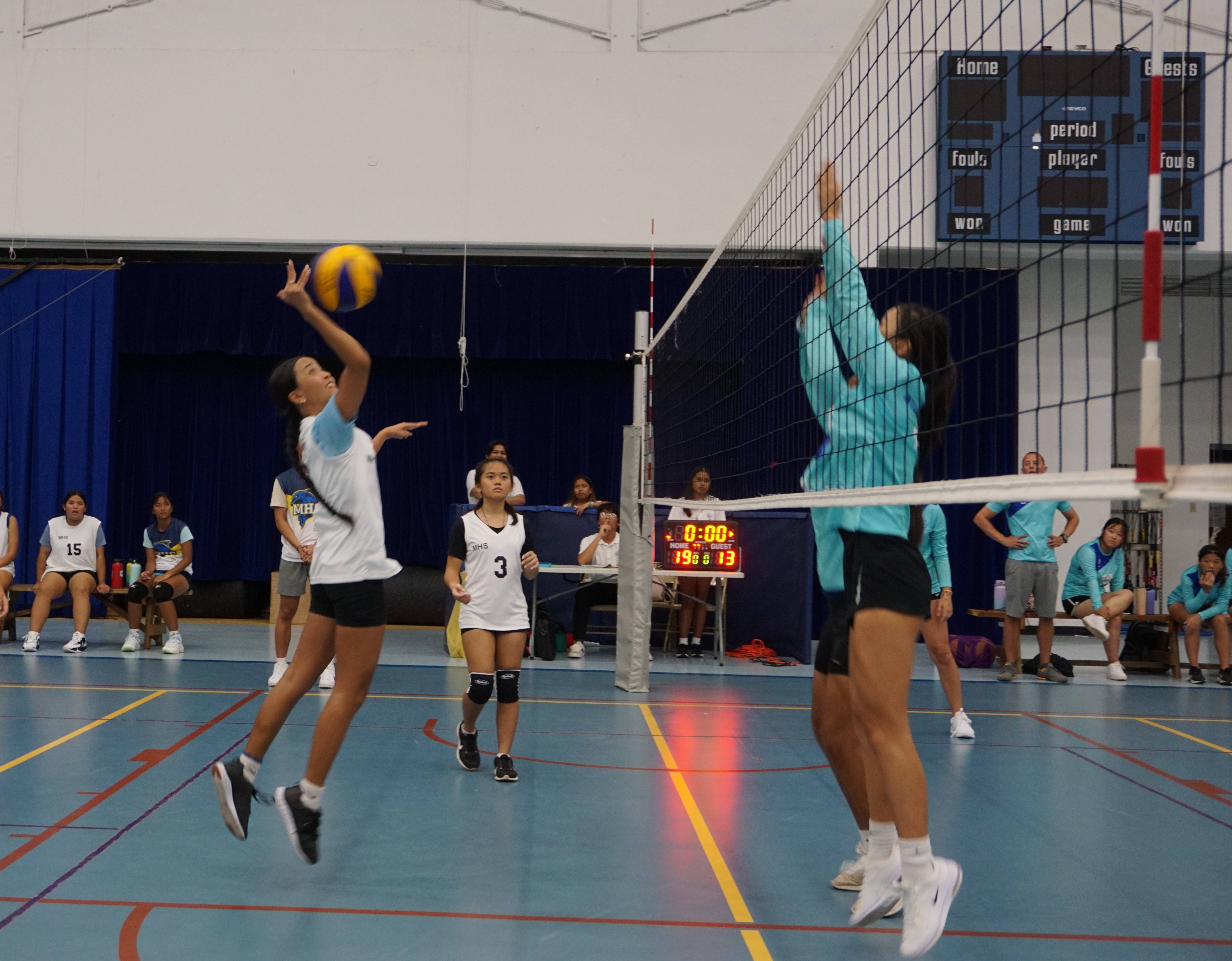 An MHS II player extends for the spike return during an opening game of the NMIVA-PSS Girls High School Volleyball League SY 23-24 on Tuesday at the Marianas High School gym.